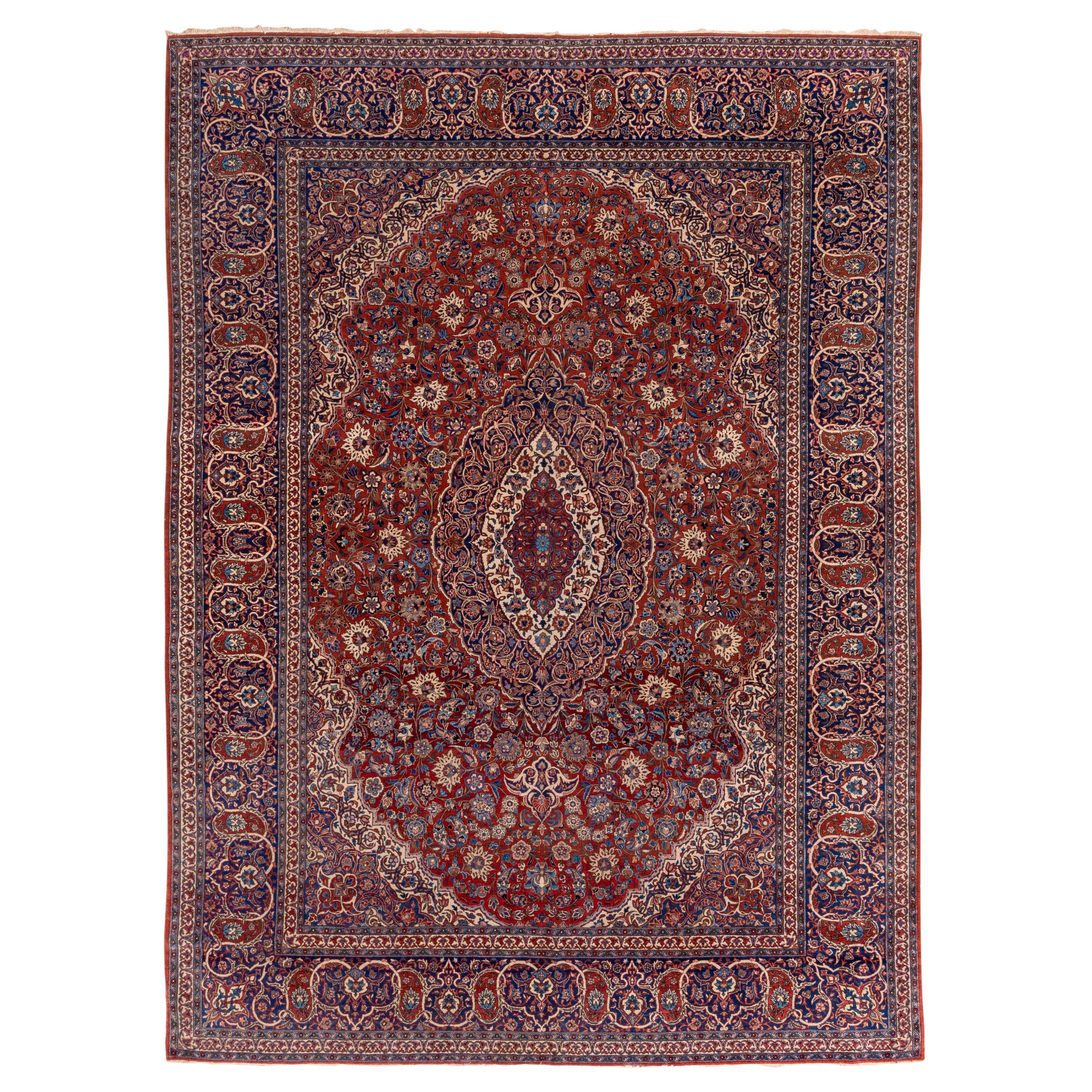 Fine Antique Persian Isfahan Carpet, Red Field, Center Medallion, Blue Accents