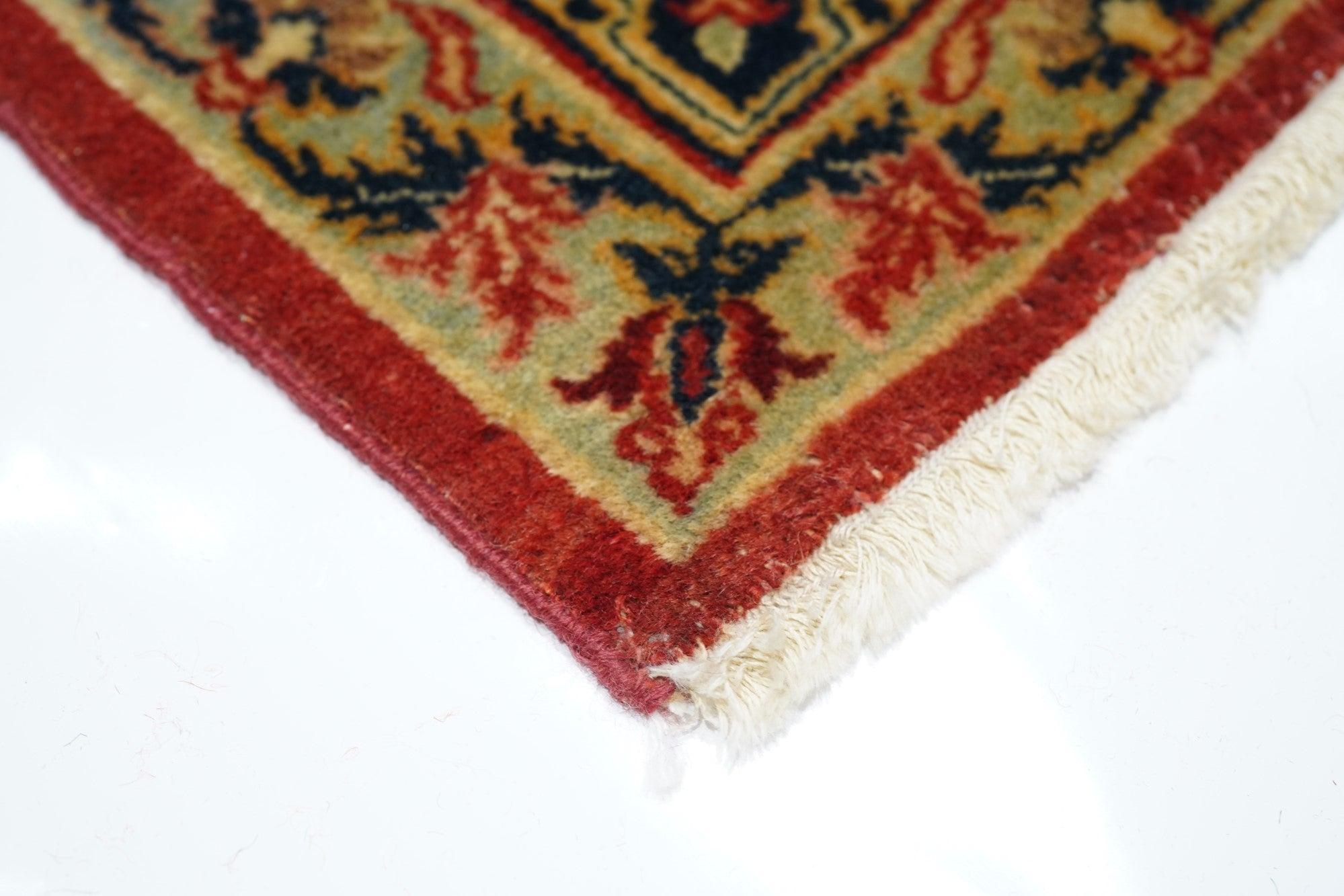 Fine Antique Persian Isfahan Rug 7'7'' x 10'11''. The very unusual ecru border features rectangular red cartouches Alternating with staw finialed small octogrammed, surrounding the cream field. Strong red half-medallions push in from the sides while