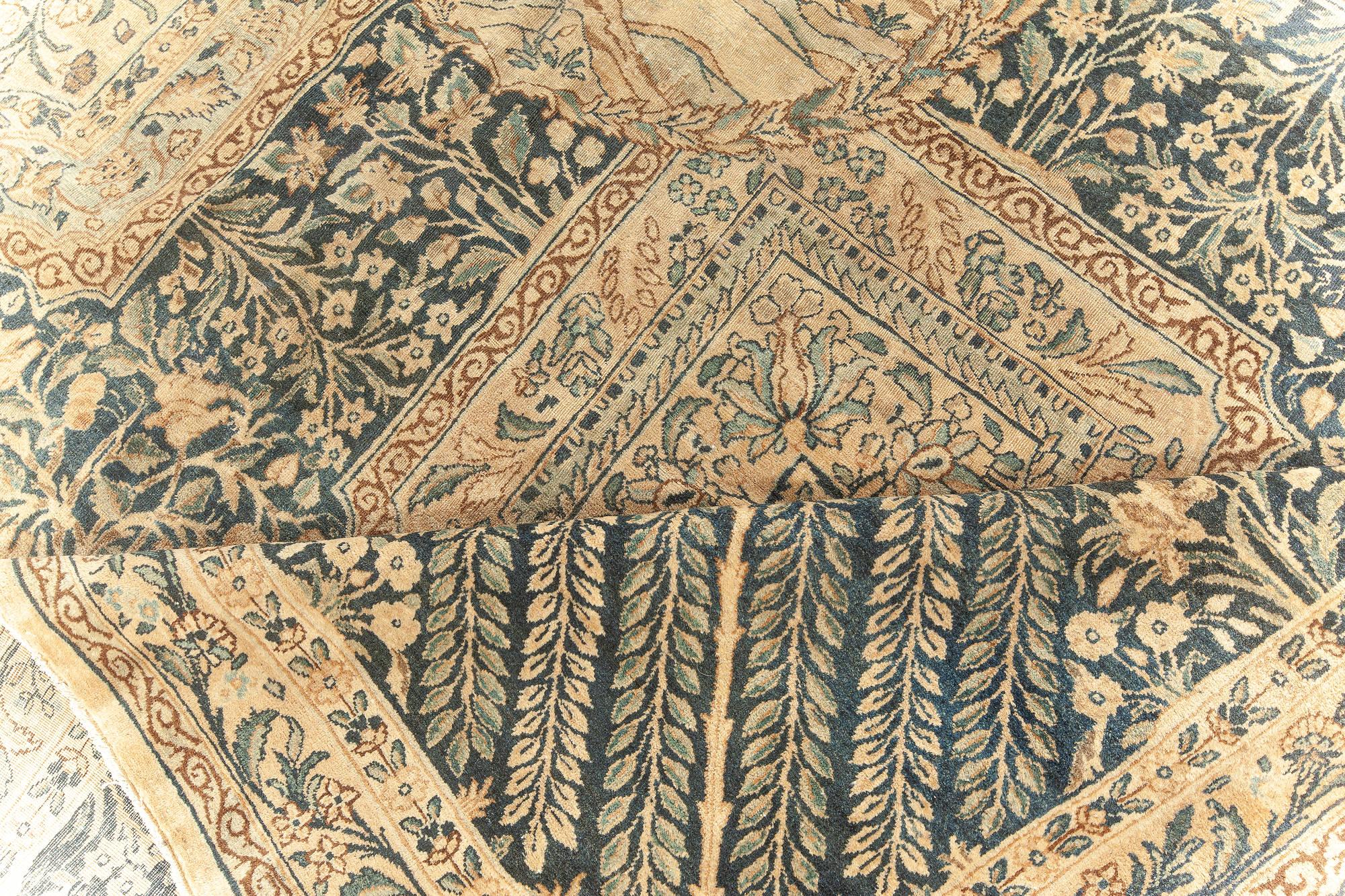 Fine Antique Persian Kirman handmade wool rug
Size: 11'9