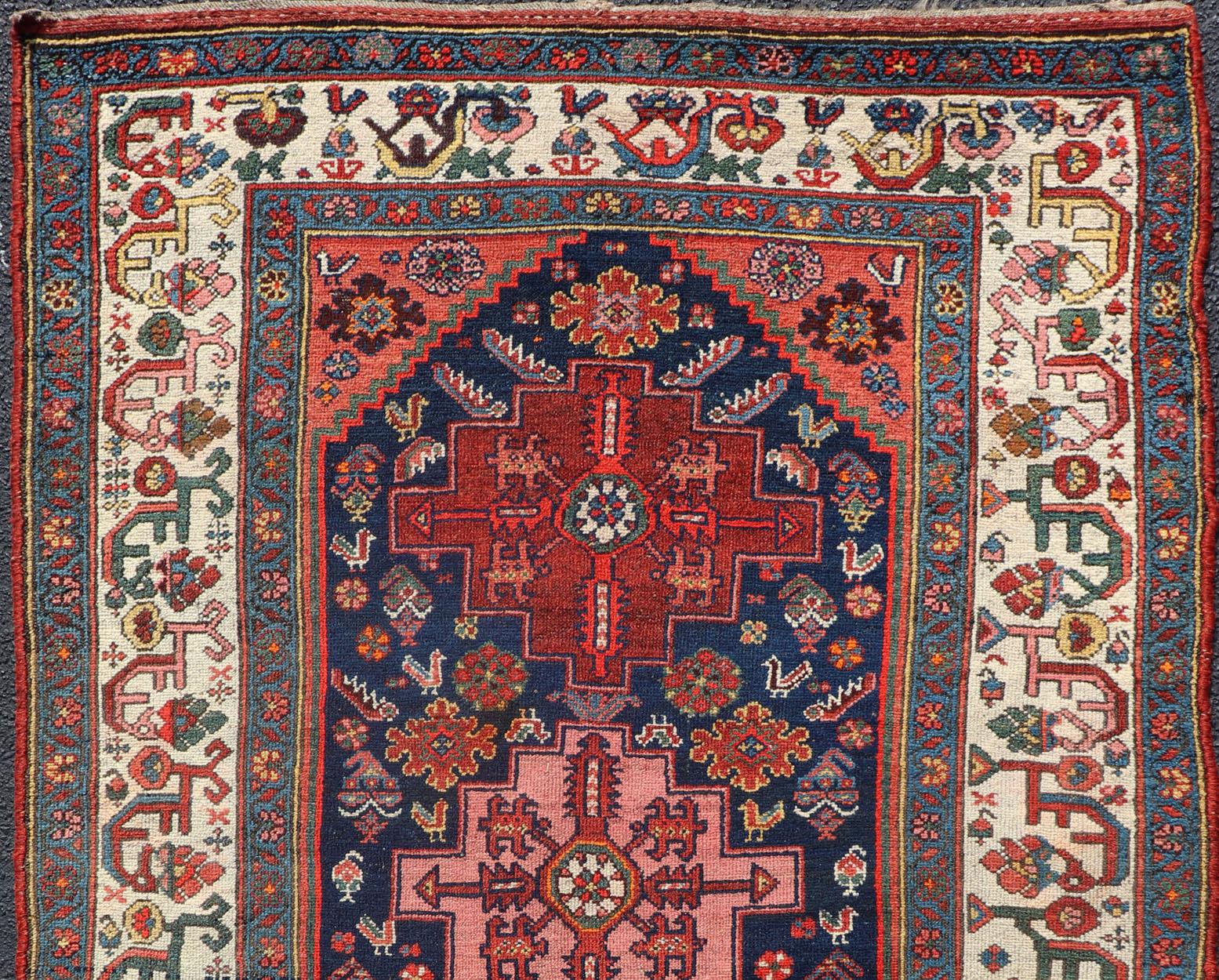 Tribal Fine Antique Persian Kurdish Rug with Medallion Design in Blue, Red, and Ivory For Sale