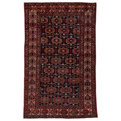 Antique Persian Ghazvin Rug with Flower Medallion over a Blue Field ...