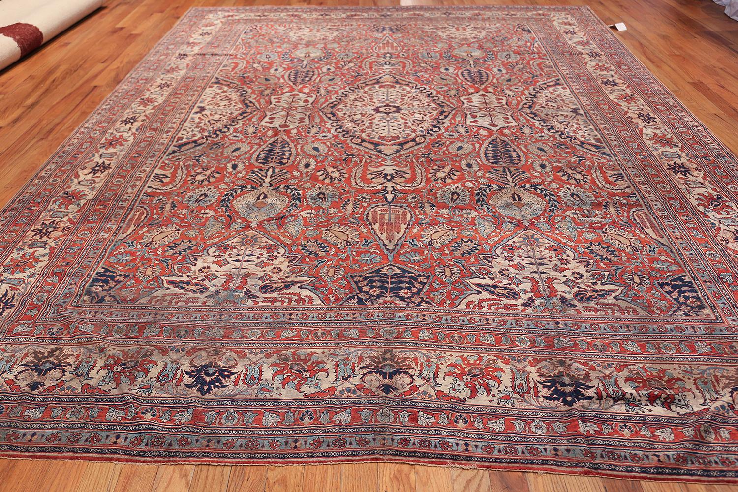 Antique Persian silk Heriz carpet, country of origin: Persia, date: circa late 19th century. Size: 10 ft x 13 ft (3.05 m x 3.96 m)

Here is a striking antique Oriental rug, an antique Heriz rug, woven with silk threads by the celebrated rug makers