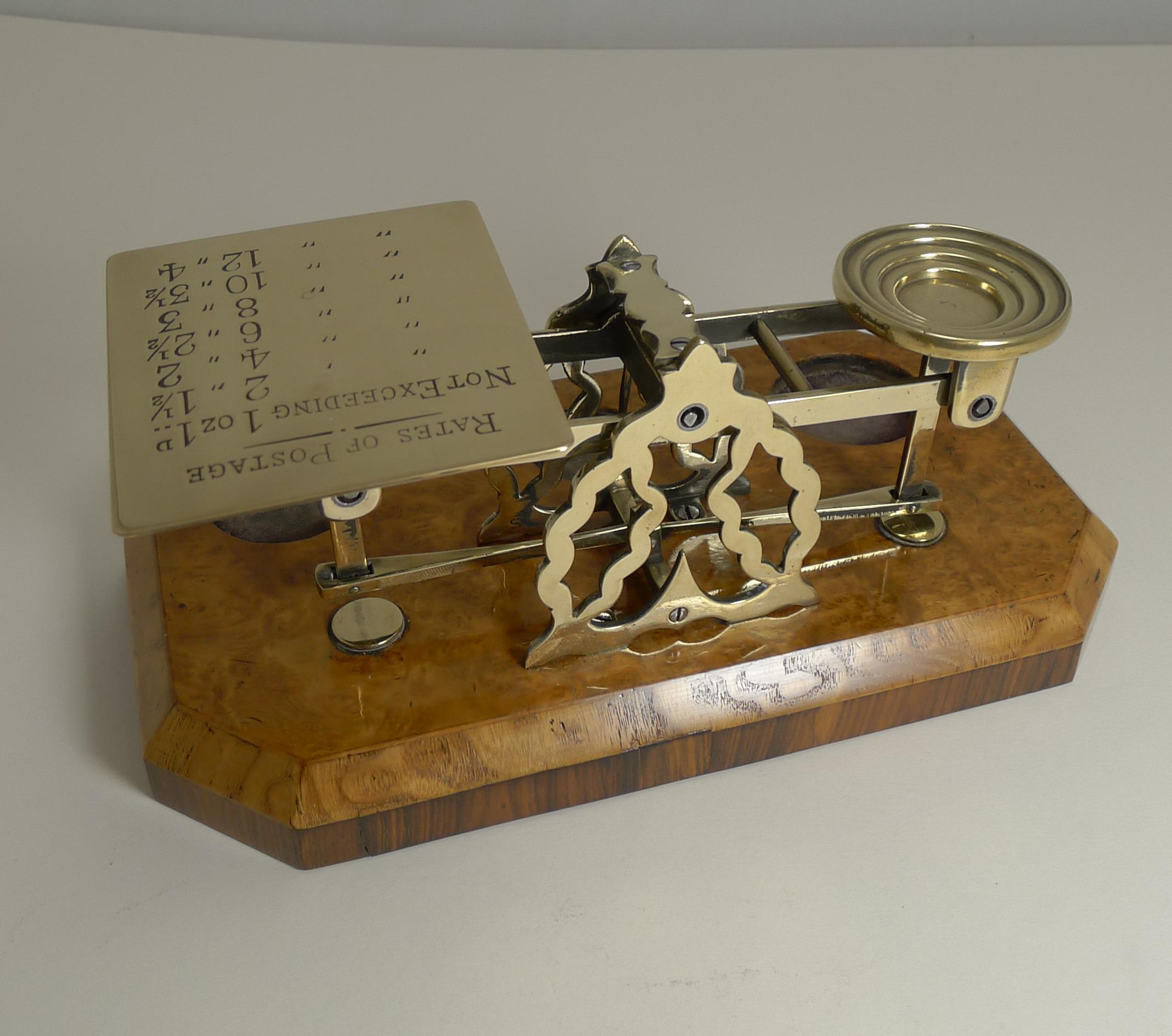 A very fine and unusual example of Victorian postal / letter scale dating to c.1890 and made by the top-notch maker, Sampson Mordan & Co. of London; signed across the balance.

The base is what makes this an unusual example veneered with three