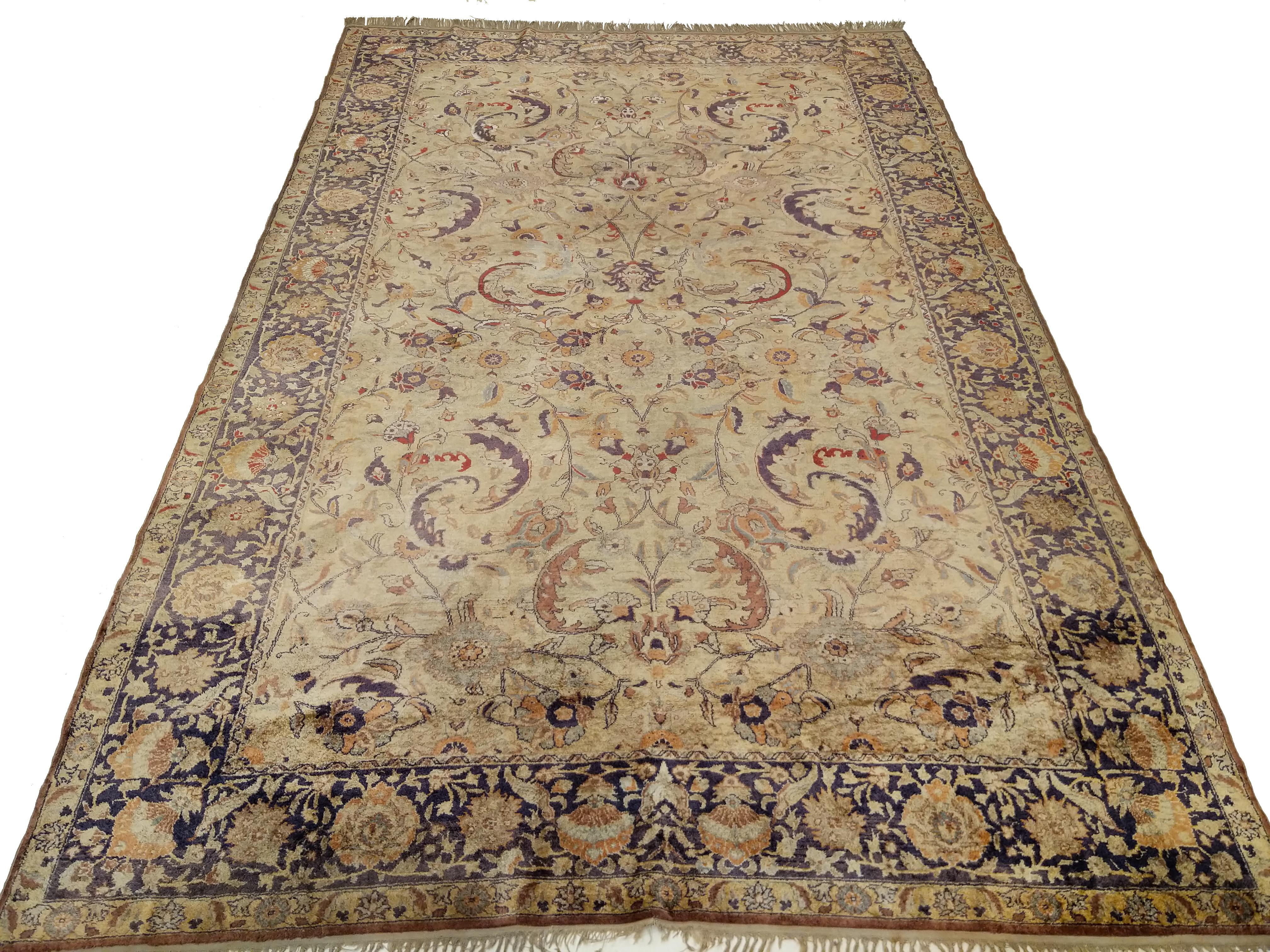 A very finely woven Kayseri rug from eastern Anatolia, hand knotted entirely in pure silk, distinguished by an all over pattern of stylized leafs and palmettes on an ivory background. The amazing condition of the rug allows us to enjoy the beauty
