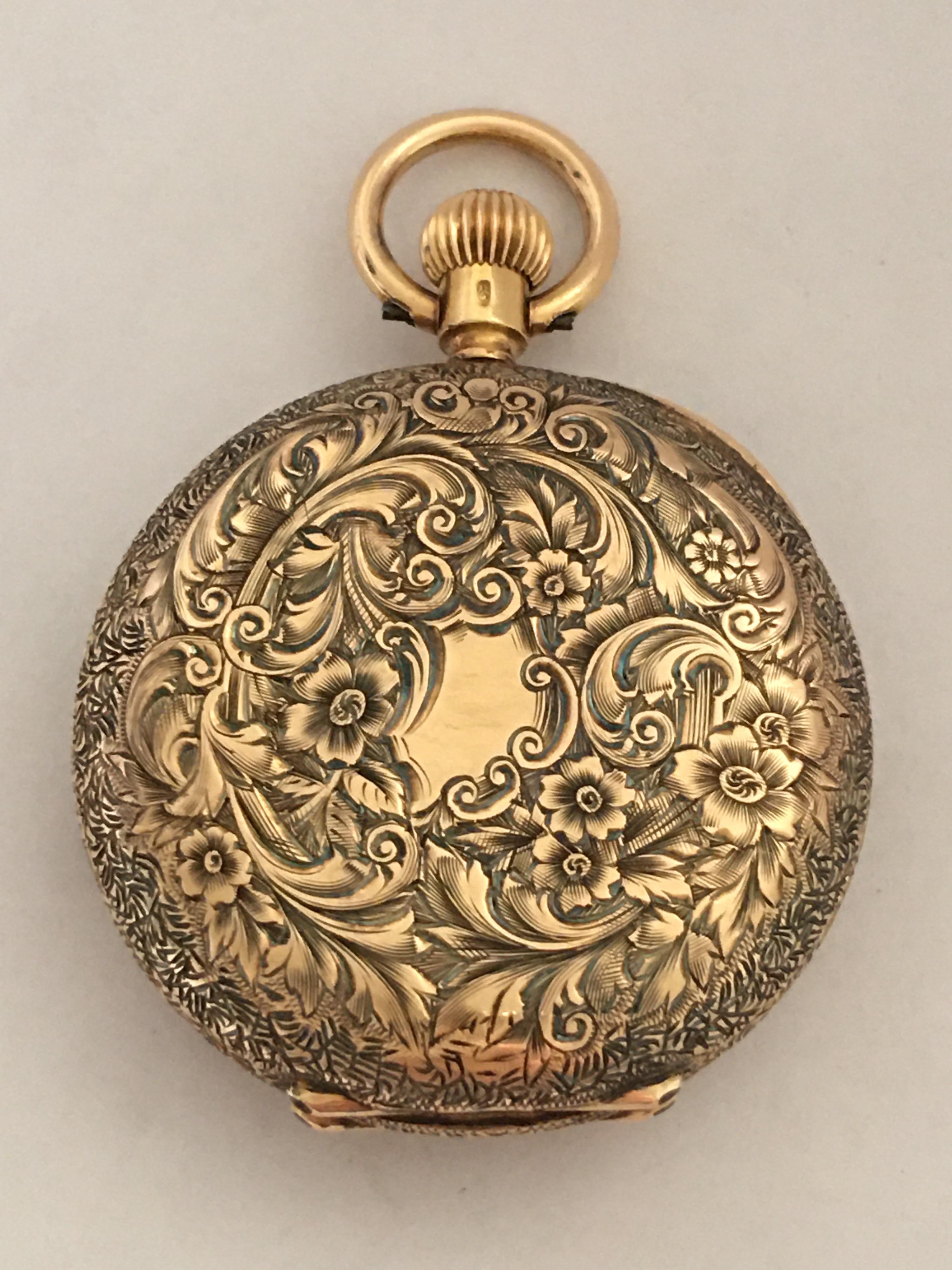 This beautiful and small 33mm diameter antique small gold half hunter Pocket Watch is in good Working condition and it is ticking well. This watch weighed 26.7 grams 

Please study the images carefully as form part of the description.