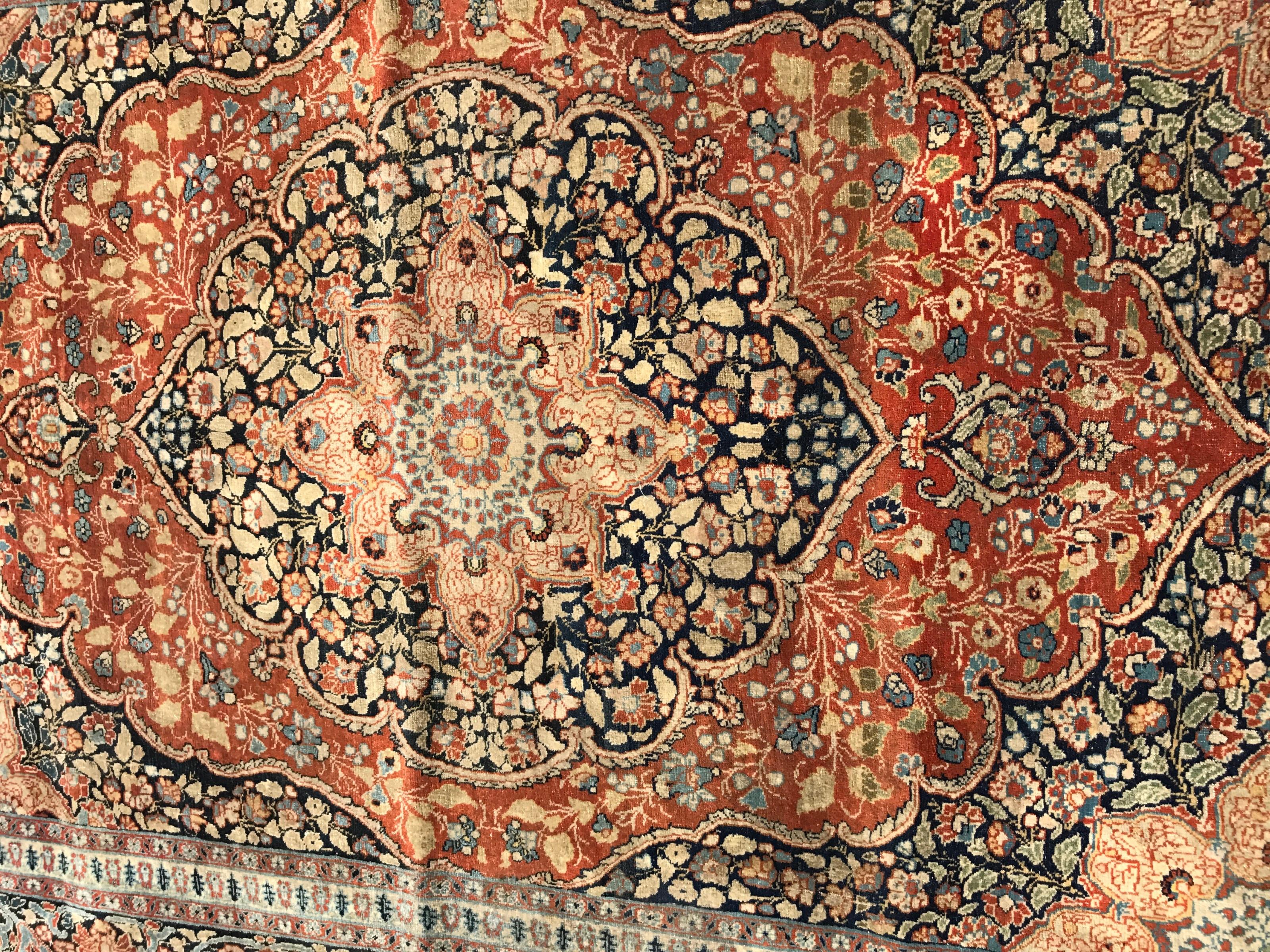 Very beautiful late 19th century fine hand knotted rug with beautiful design and natural colors with orange, blue and a brown black colors, entirely and finely hand knotted with wool velvet on cotton foundations.