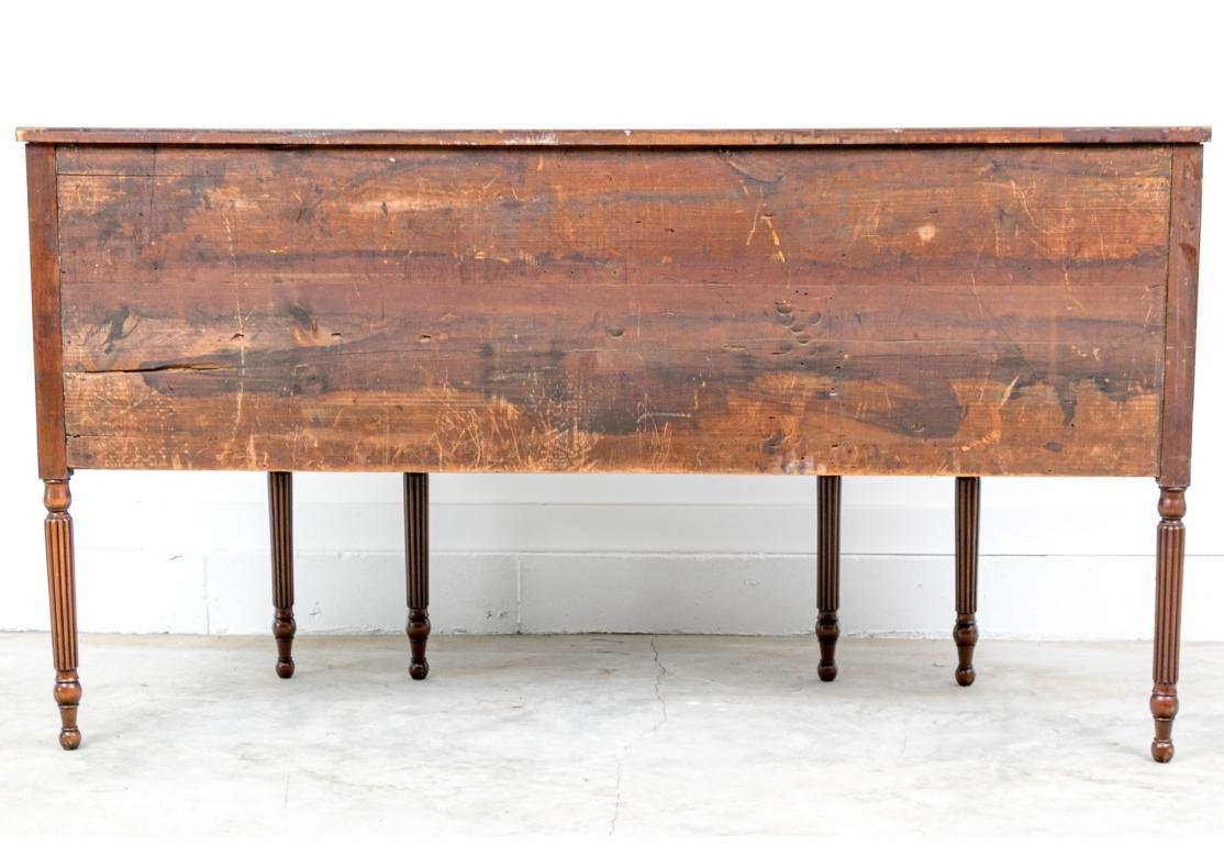 Fine Antique tSheraton Style Flame Mahogany Sideboard In Distressed Condition For Sale In Bridgeport, CT
