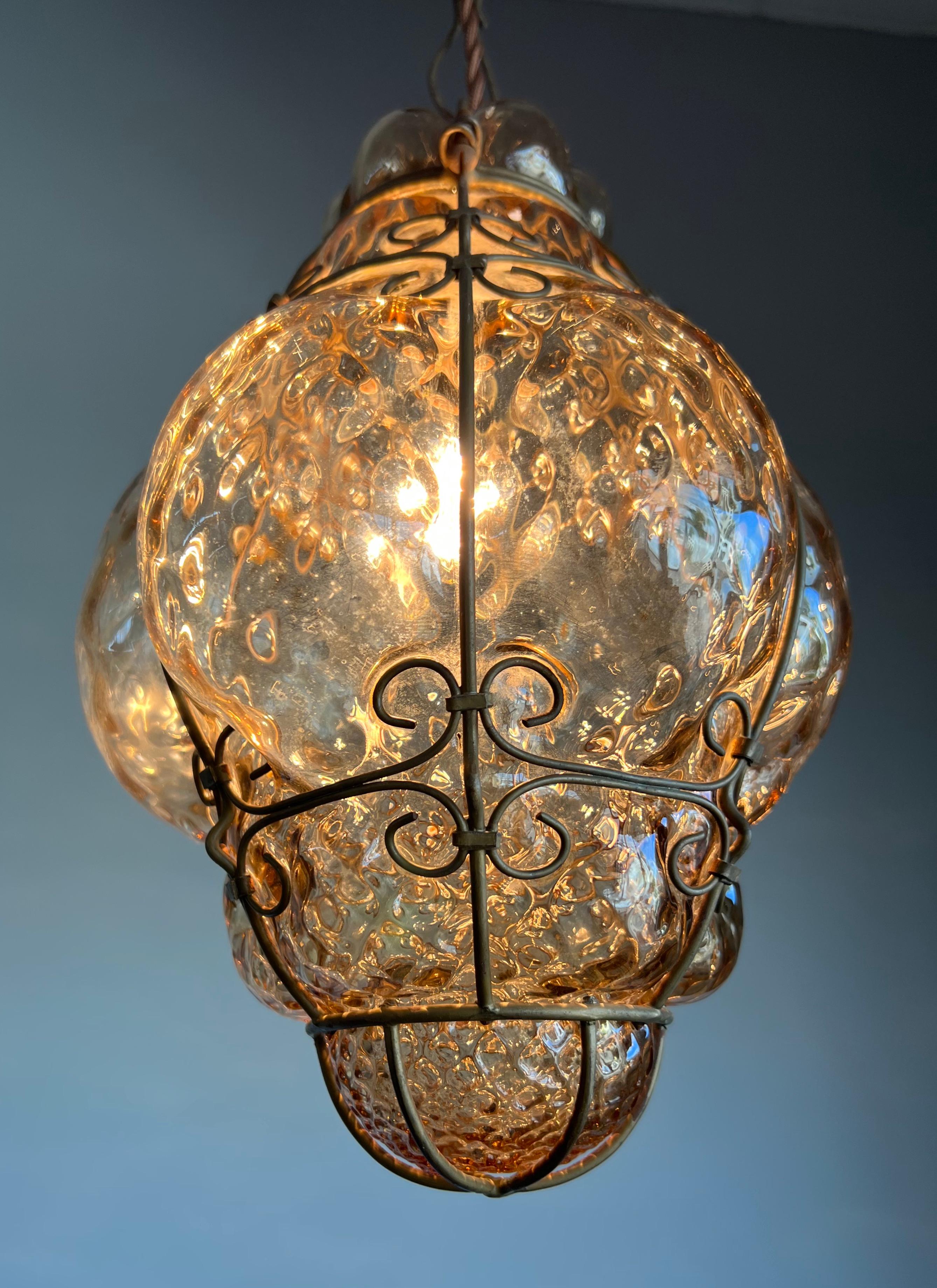 Patinated Small Antique Venetian Mouth Blown Smoked Glass Art in Iron Frame Pendant Light For Sale