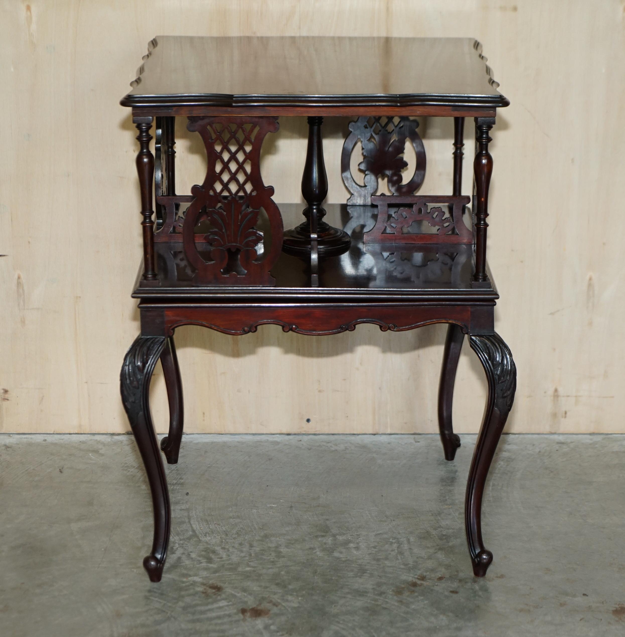 We are delighted to offer for sale this very well made English mahogany circa 1880-1900 Aesthetic Movement revolving bookcase table with nicely carved cabriolet legs and fret work panels 

A good looking and well made piece, this is the first one