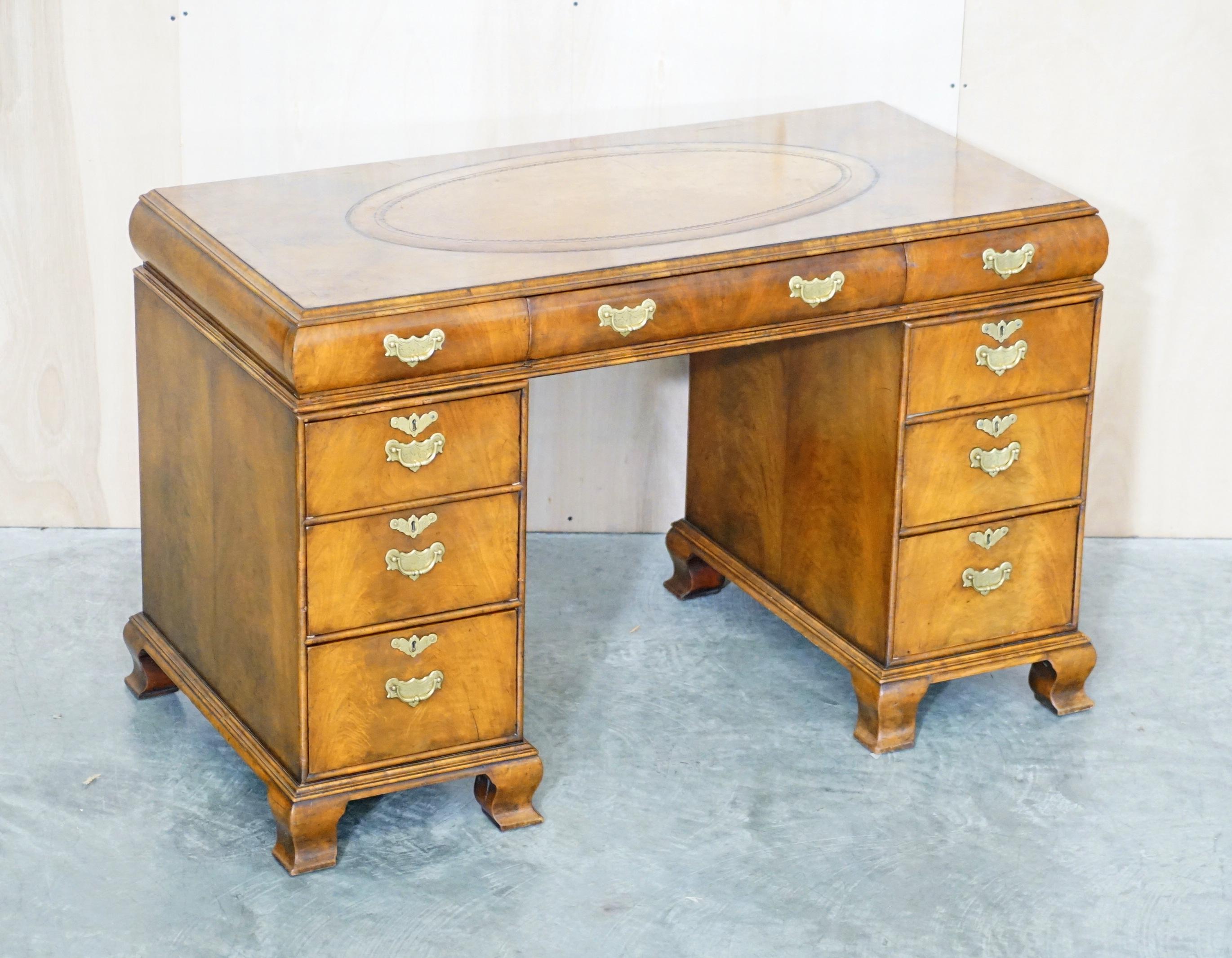 We are delighted to offer for sale this very fine fully, Antique circa 1880, Burr Walnut twin pedestal partner desk with hand dyed brown leather top.

What a desk….. these cushion curved drawer desks almost never come up for sale, they are based