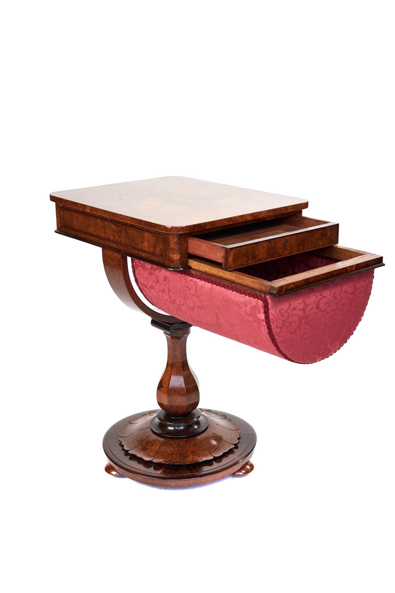 Fine antique Victorian burr walnut work table having a marvelous burr walnut top, a single drawer to the side and a half moon shaped sewing drawer covered in a pretty pink floral material, half-moon burr walnut support beneath and a burr walnut