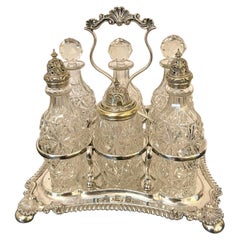 Fino juego de vinagreras victorianas antiguas de seis botellas bañadas en plata
