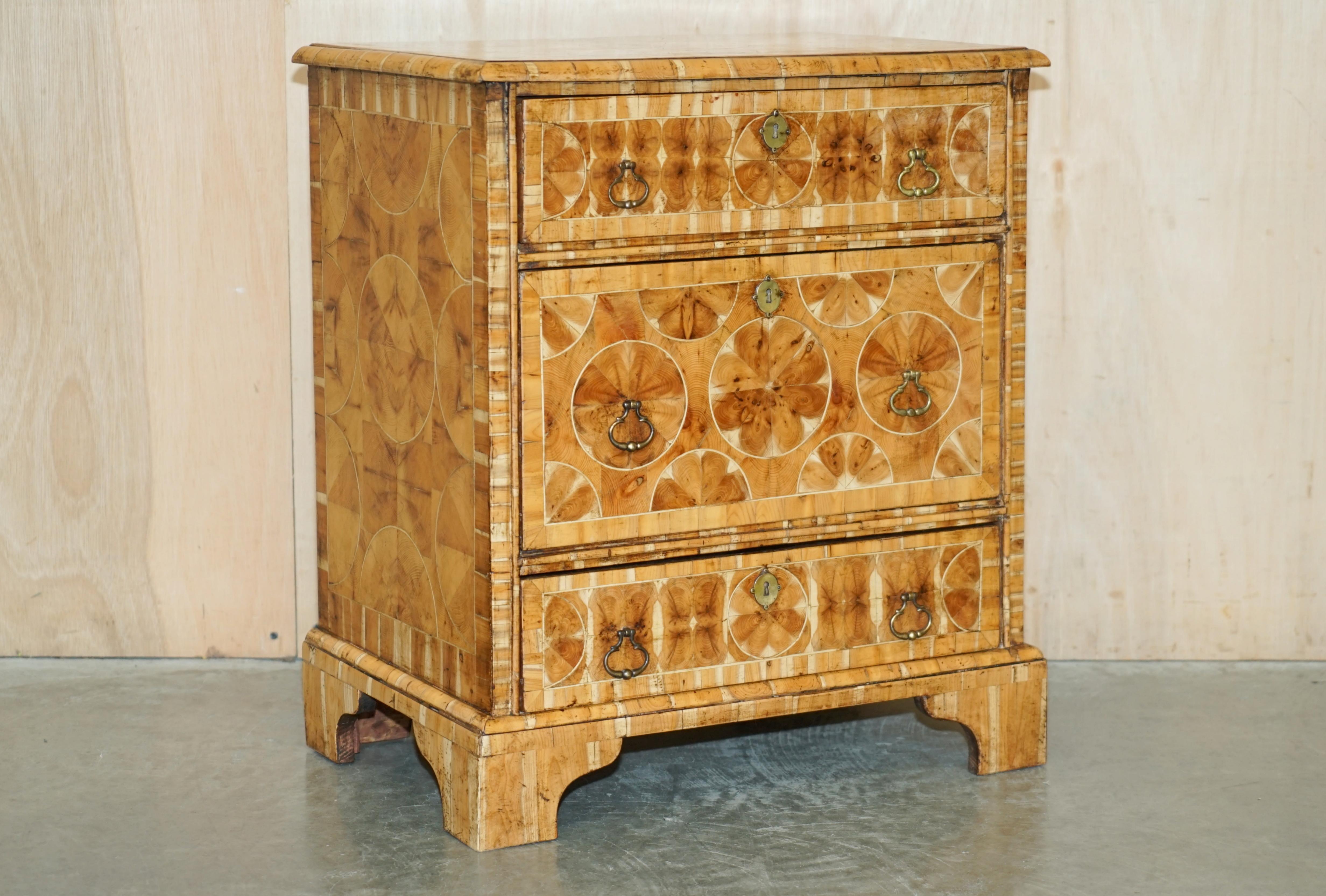 We are delighted to offer for sale this absolute work of Art of a nightstand sized Chest of Drawers in pine with Oyster / Laburnum wood finish which dates to the end of the William & Mary era circa 1700

Wow, I mean just wow. This is quite simply