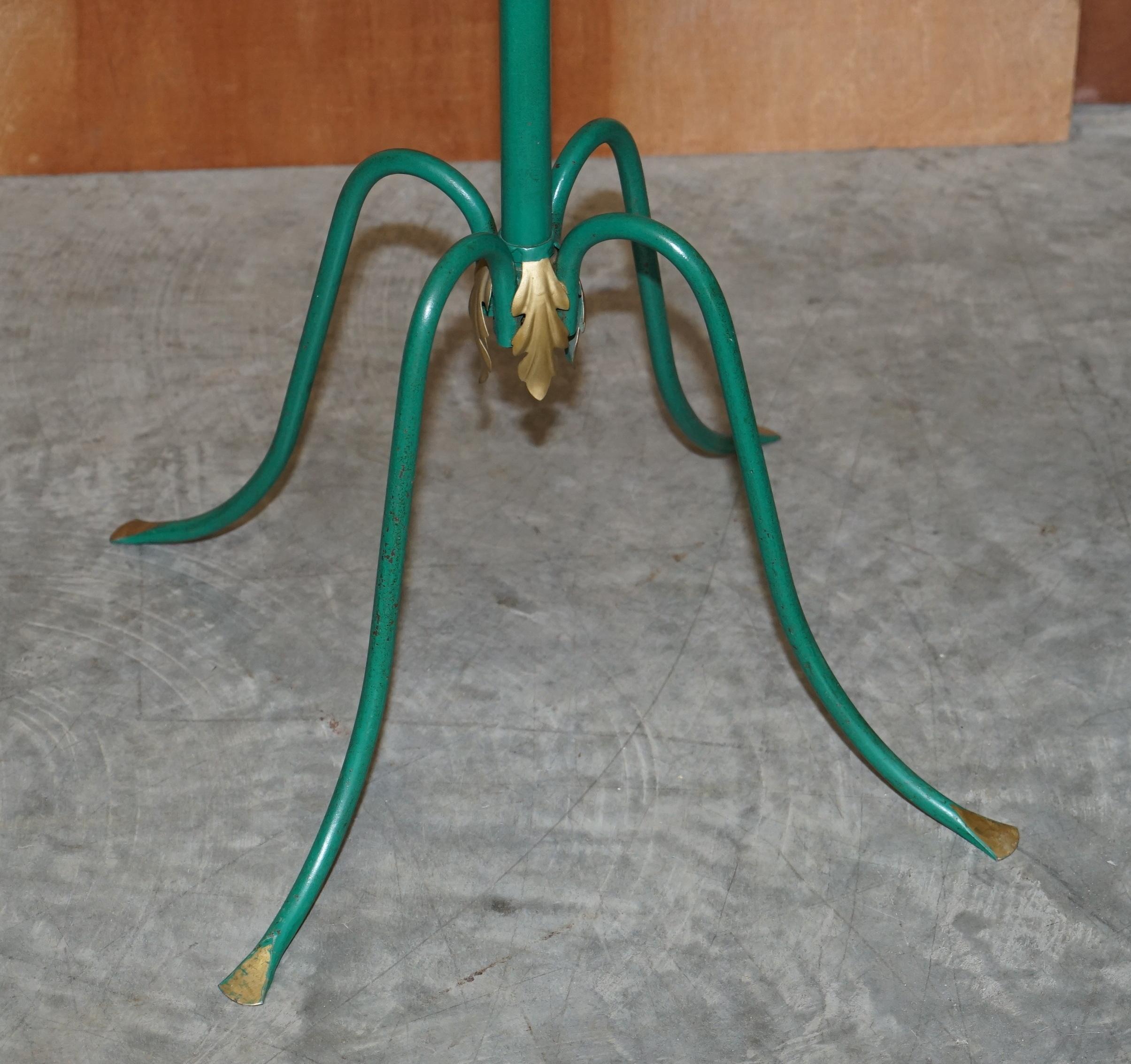 We are delighted to offer for sale this stunning original continental circa 1880 wrought iron coat stand with period green paint and gold leaf accents

This is a bit of a unicorn in the world of coat stands, it’s a very classically European style,