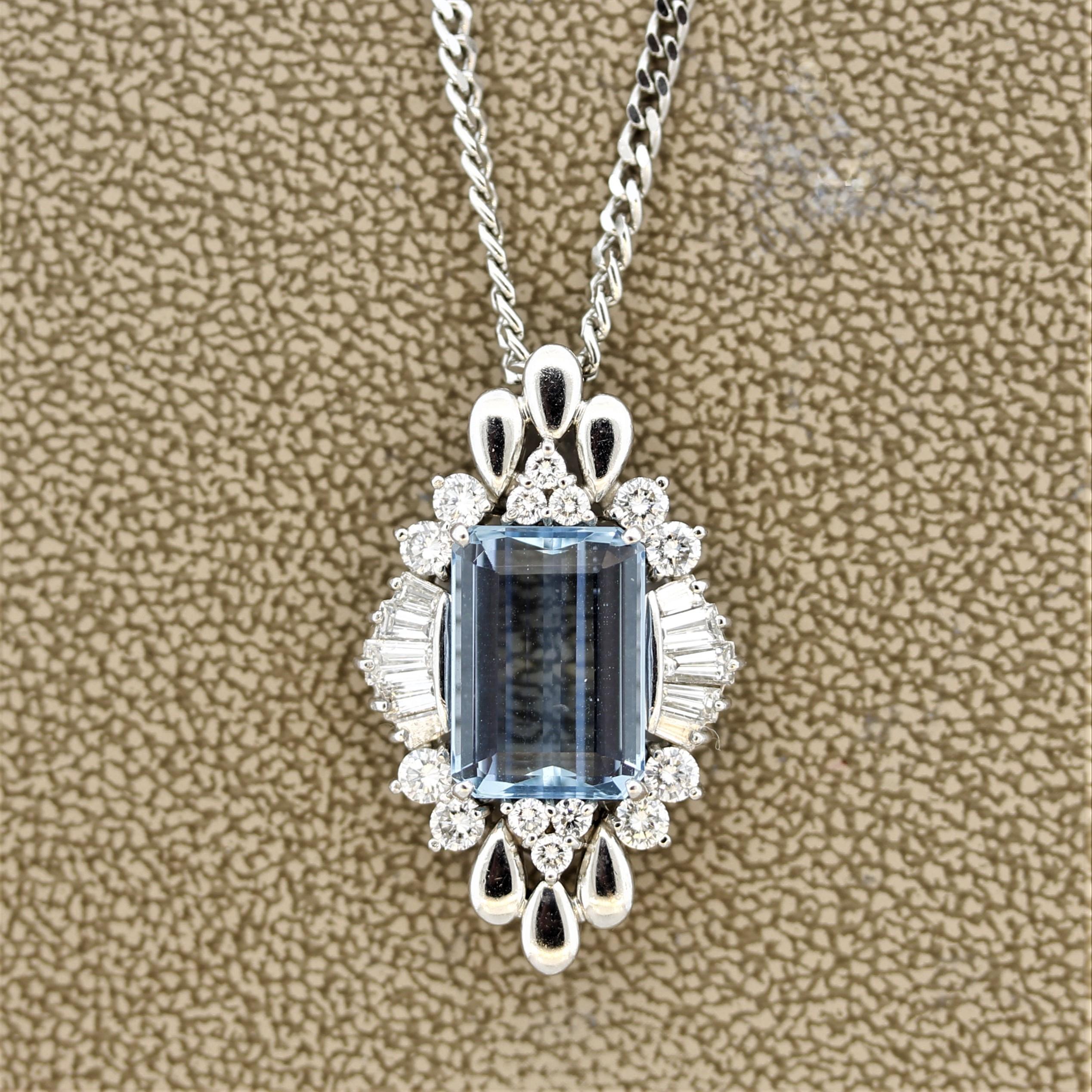 Truly one of our favorite aquamarine pieces. The pendant features an extra fine 4.88 carat aquamarine with a bright sea blue color. It is cut in an emerald shape with excellent proportions. Accenting the aquamarine are 1.20 carats of baguette and