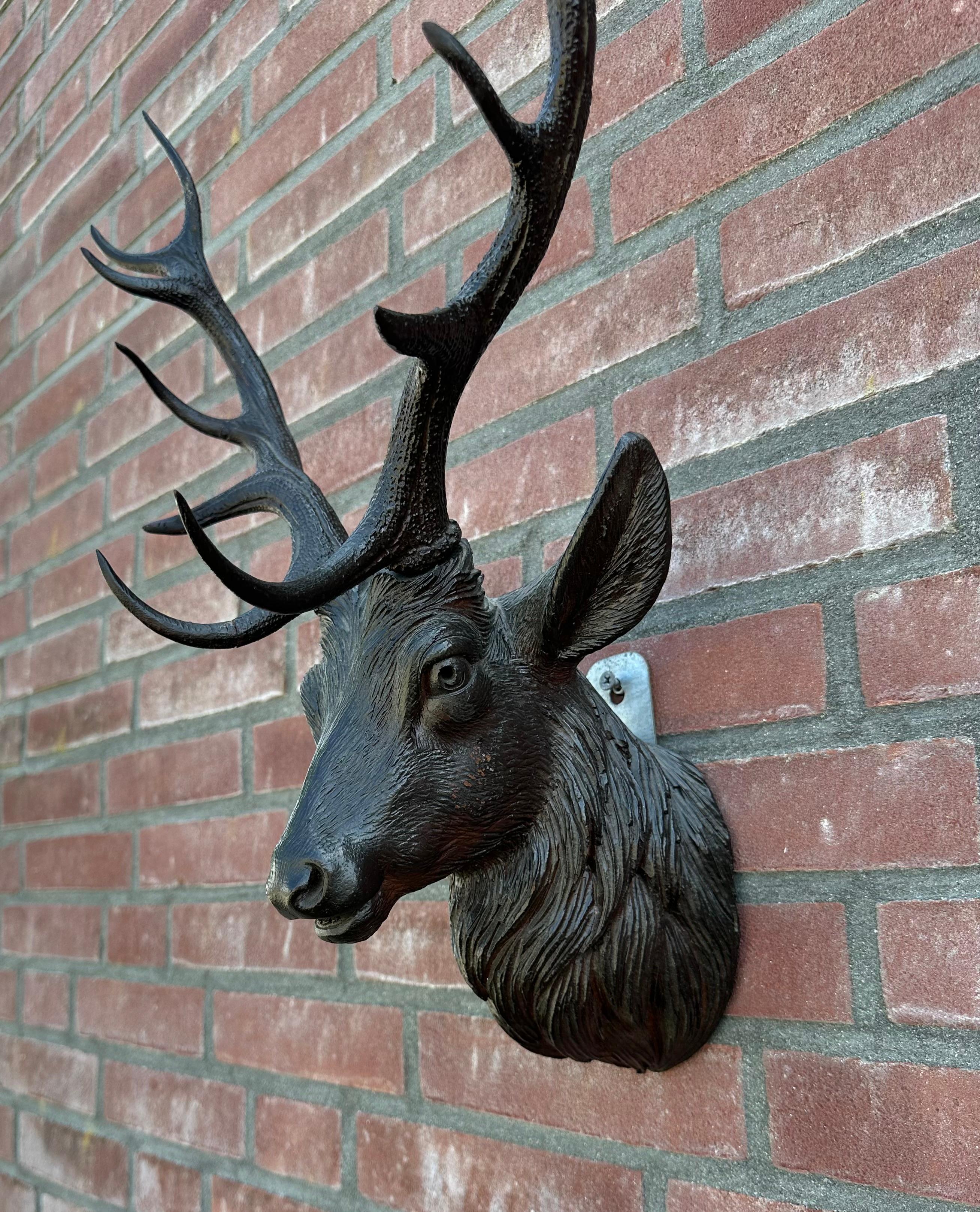 cabeza de venado tallado en madera