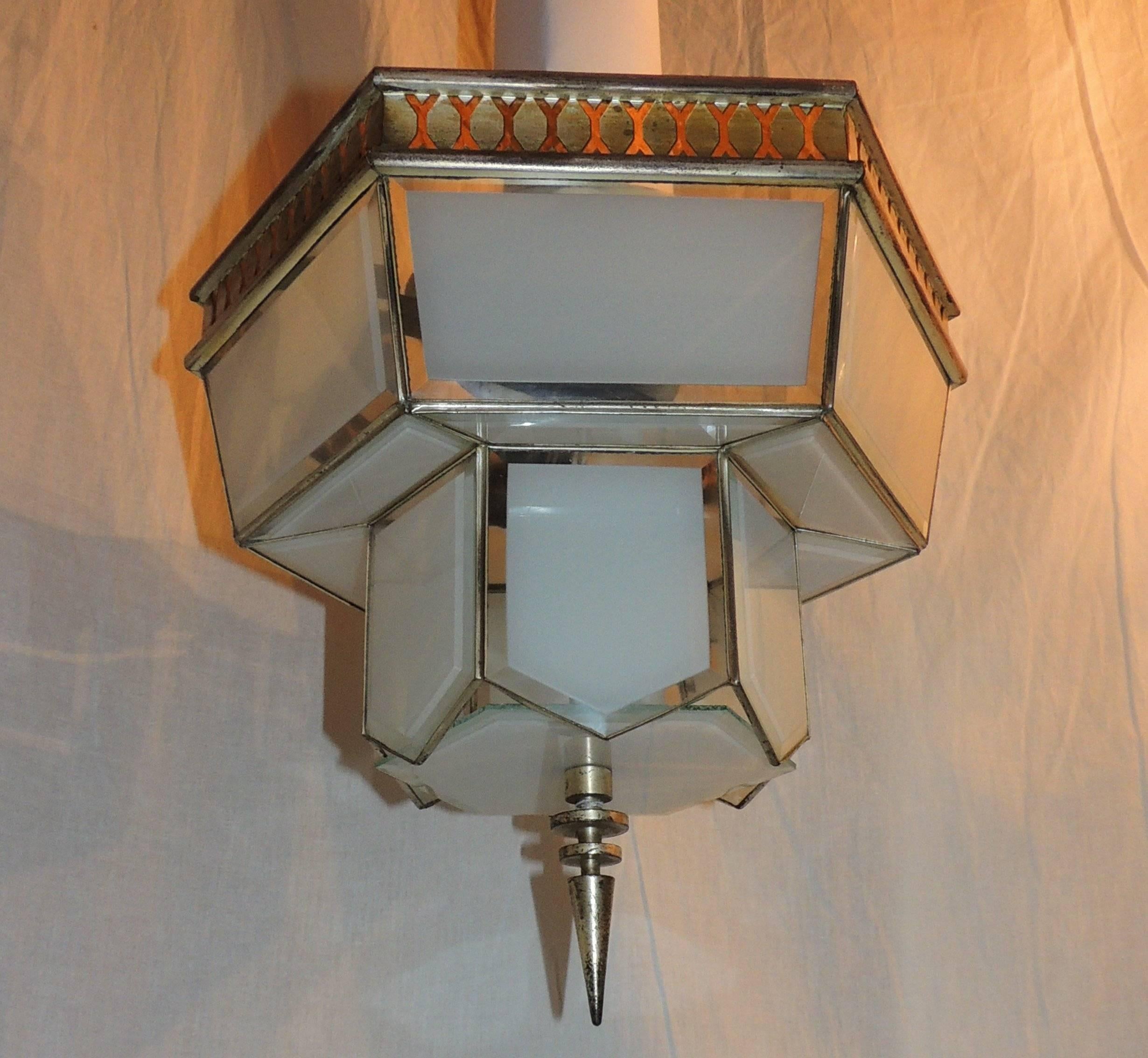 Wonderful Art Deco two-light fixture with beveled clear to frosted glass panels and original trim surrounding the top flush mount fixture.

Measures: 14