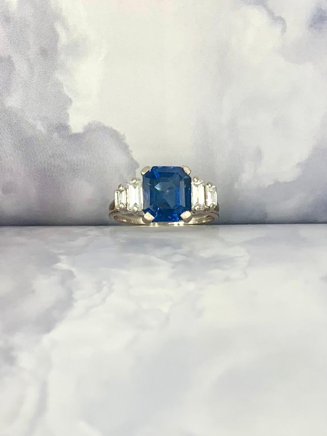 Classic, elegant estate Art Deco period 3.56 Carat natural blue sapphire diamond 18K white gold engagement ring
Early 20th Century
Sapphire: 3.56 carats, octagonal, step cut, natural corundum with no indication of heating, GIA Report: