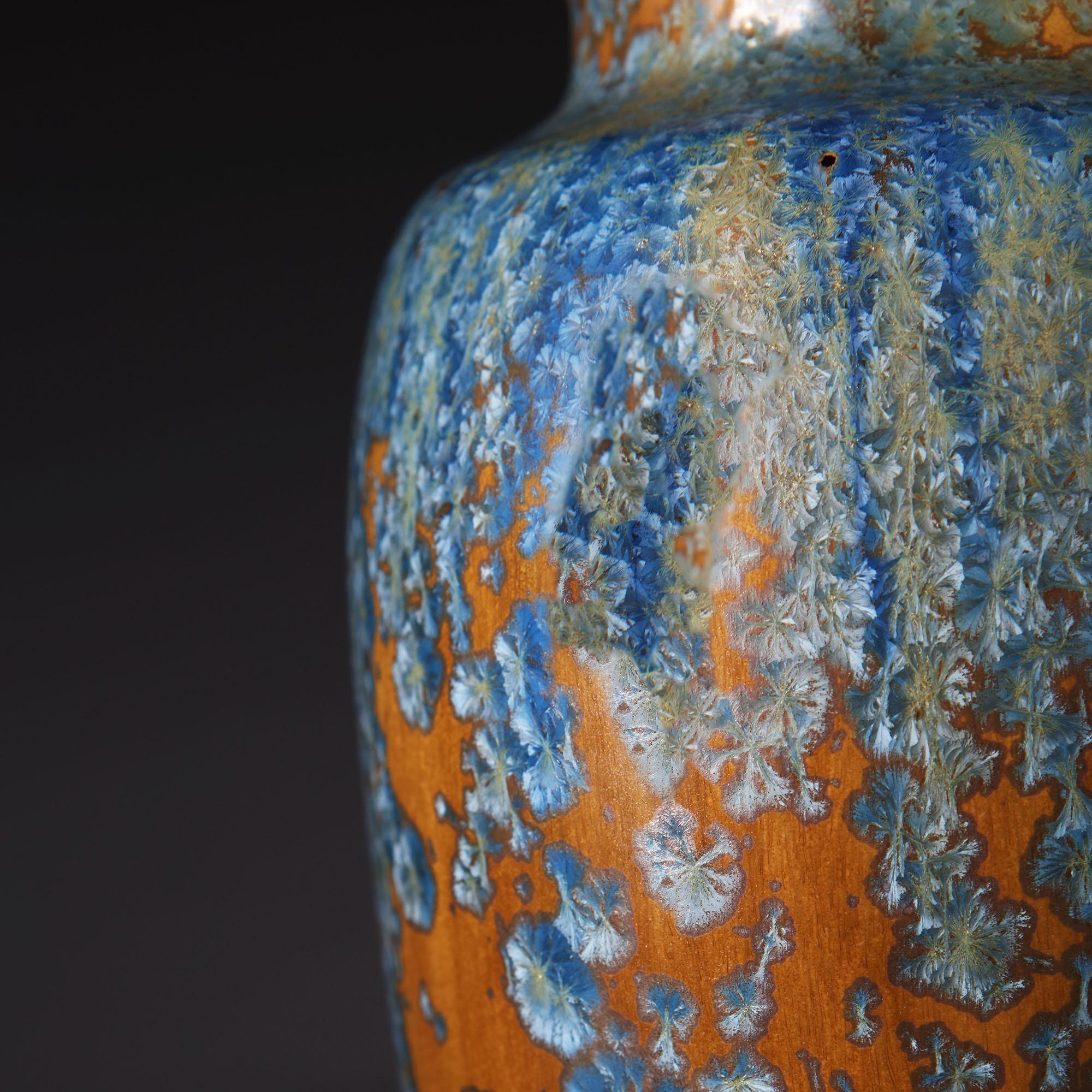 A fine early 20th century French art pottery vase with blue and amber crystalline glaze, now mounted as a lamp. Attributed to Pierrefonds.

The Societe Faienciere Heraldique de Pierrefonds pottery studio was founded in the village of Pierrefonds in