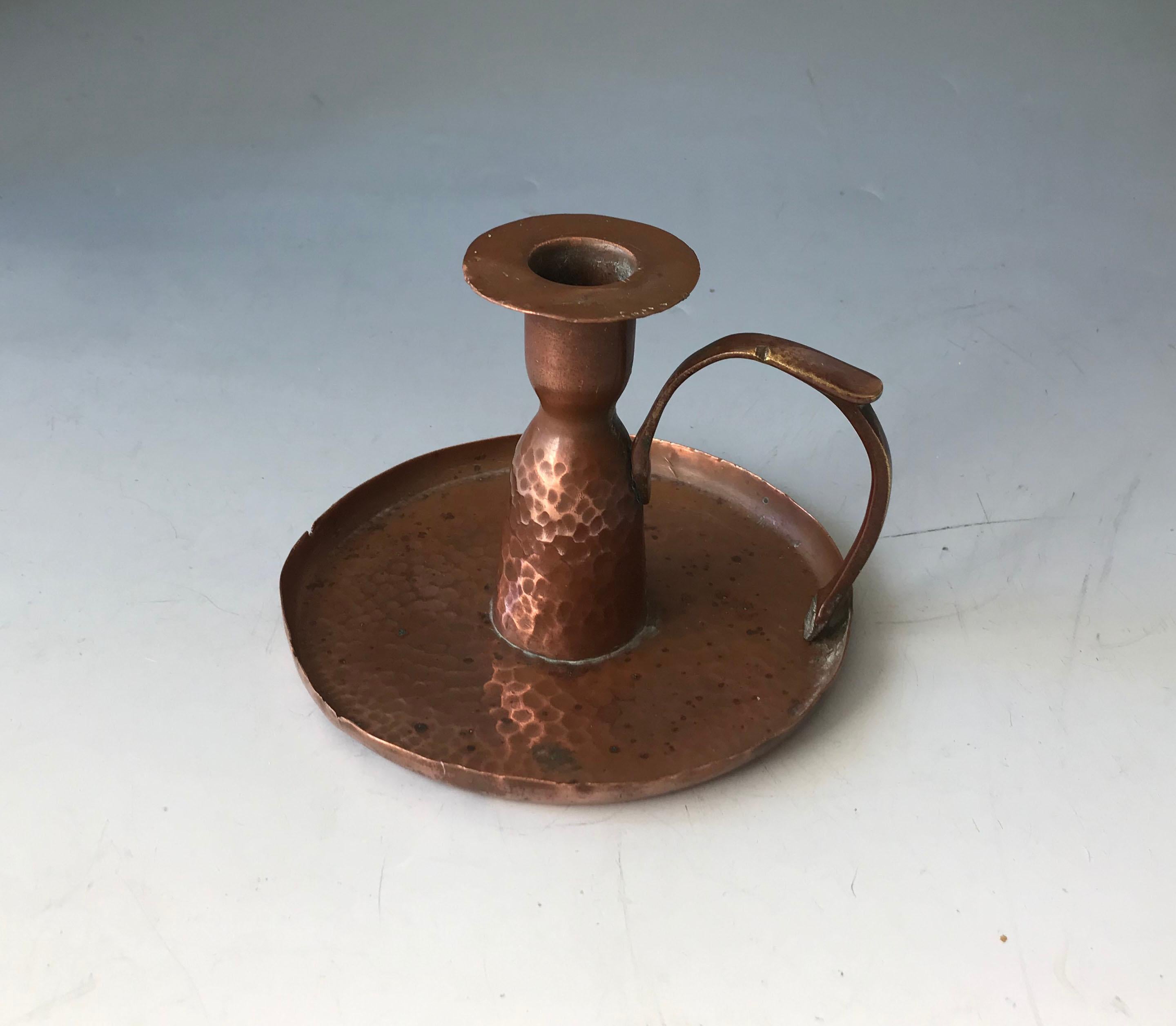 Fine Arts & crafts Hammered copper candle holder
A particularly Elegant and rare hammered copper and brass candle stock holder 
Period 1920`s A scarce piece : Makers monogram on base
Condition fine
Size 7 x 5 inches 17 x 12 cm.
    