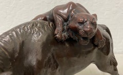 Asian Bronze Sculpture "The Lion and the Bull", 20th Century