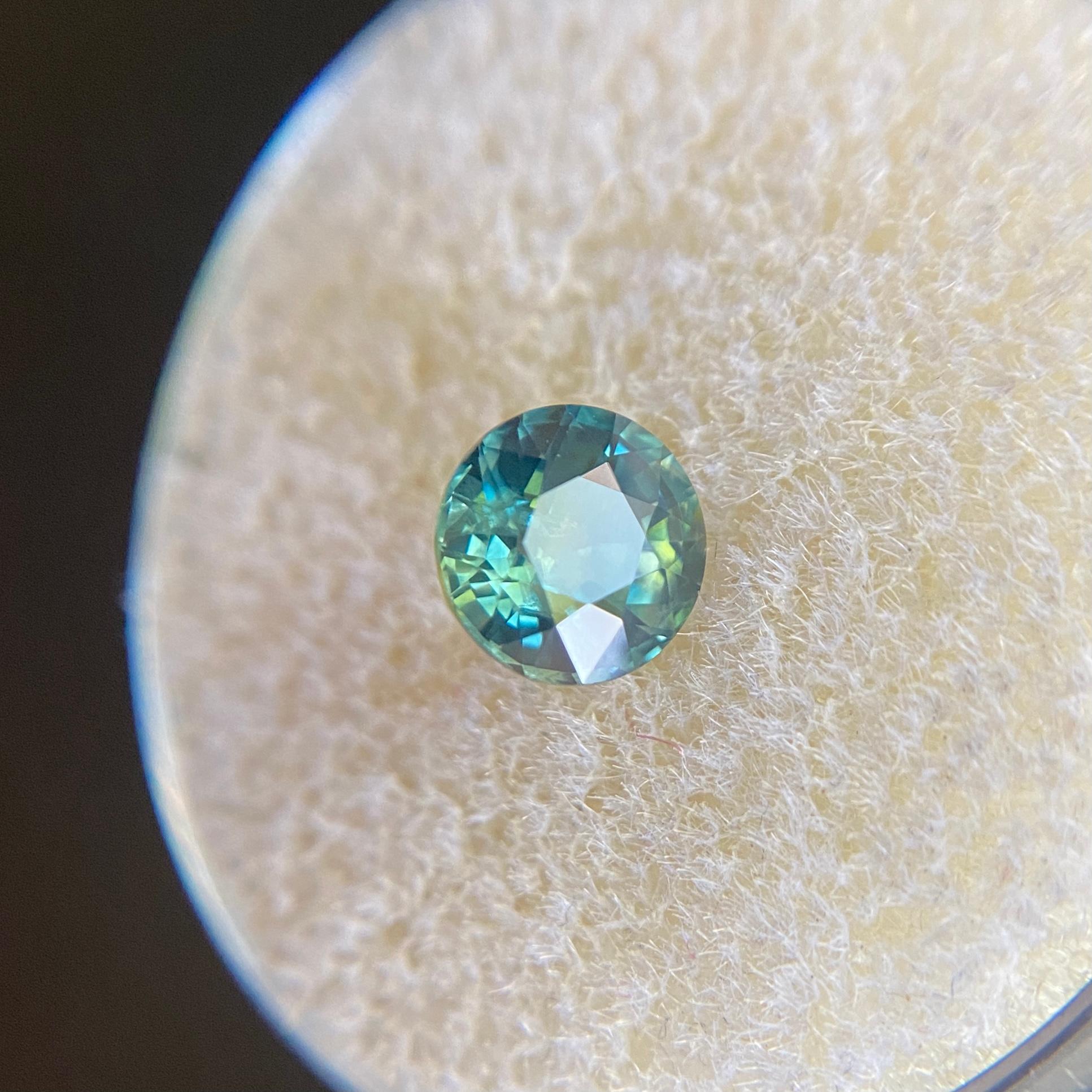 Fine Natural Australian Blue Green Sapphire Gemstone.

1.21 Carat with a beautiful and unique blue green colour and good clarity, clean stone with only some small natural inclusions visible when looking closely.

Also has an excellent round cut and