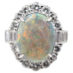Platinring mit australischem schwarzem Opal und Diamant