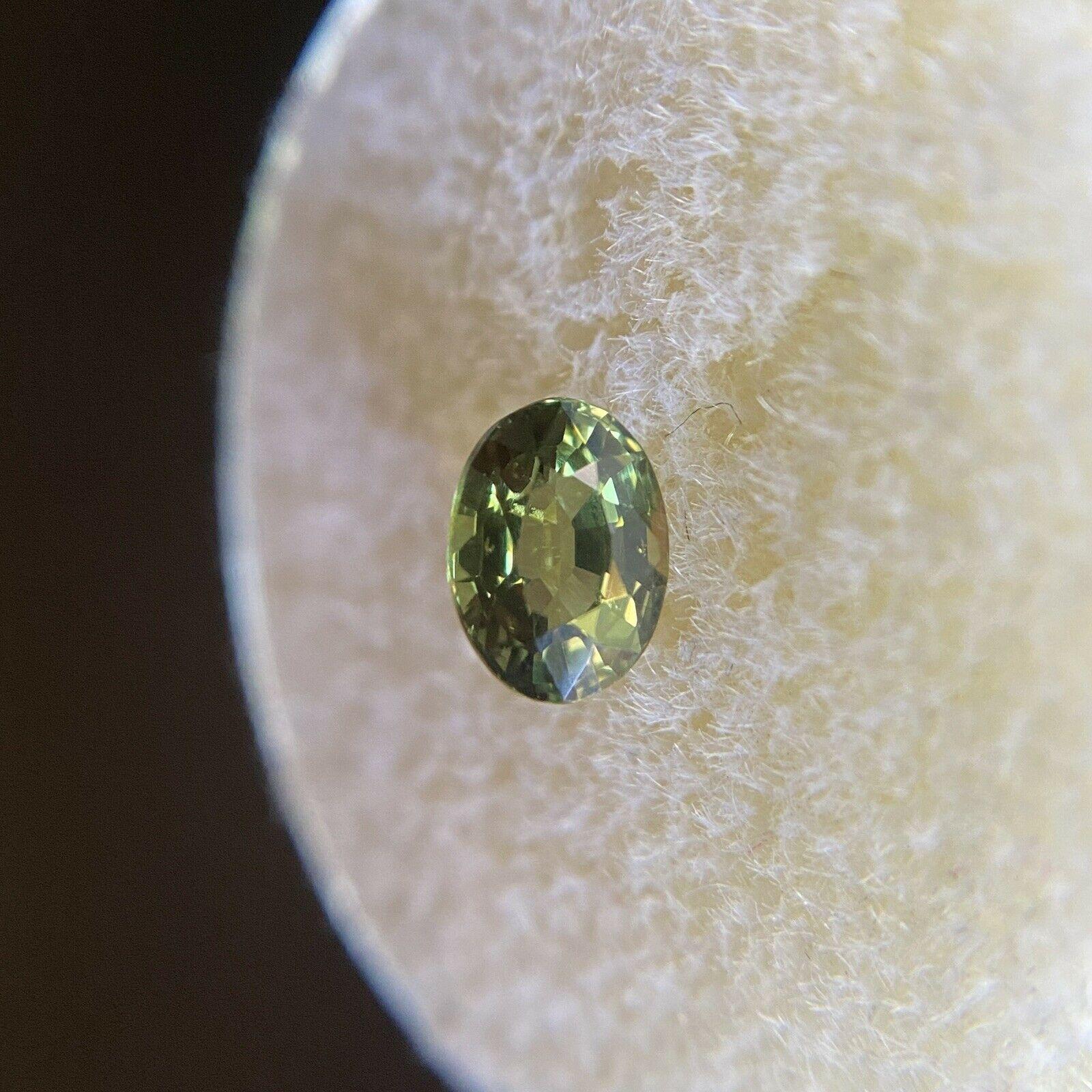 Fine Australian Vivid Green Yellow Untreated Sapphire 0.78ct Oval Cut Rare Gem

Natural Untreated Yellow Green Australian Sapphire Gemstone. 
0.78 Carat with a beautiful vivid yellow green colour. Also has excellent clarity, a very clean stone with