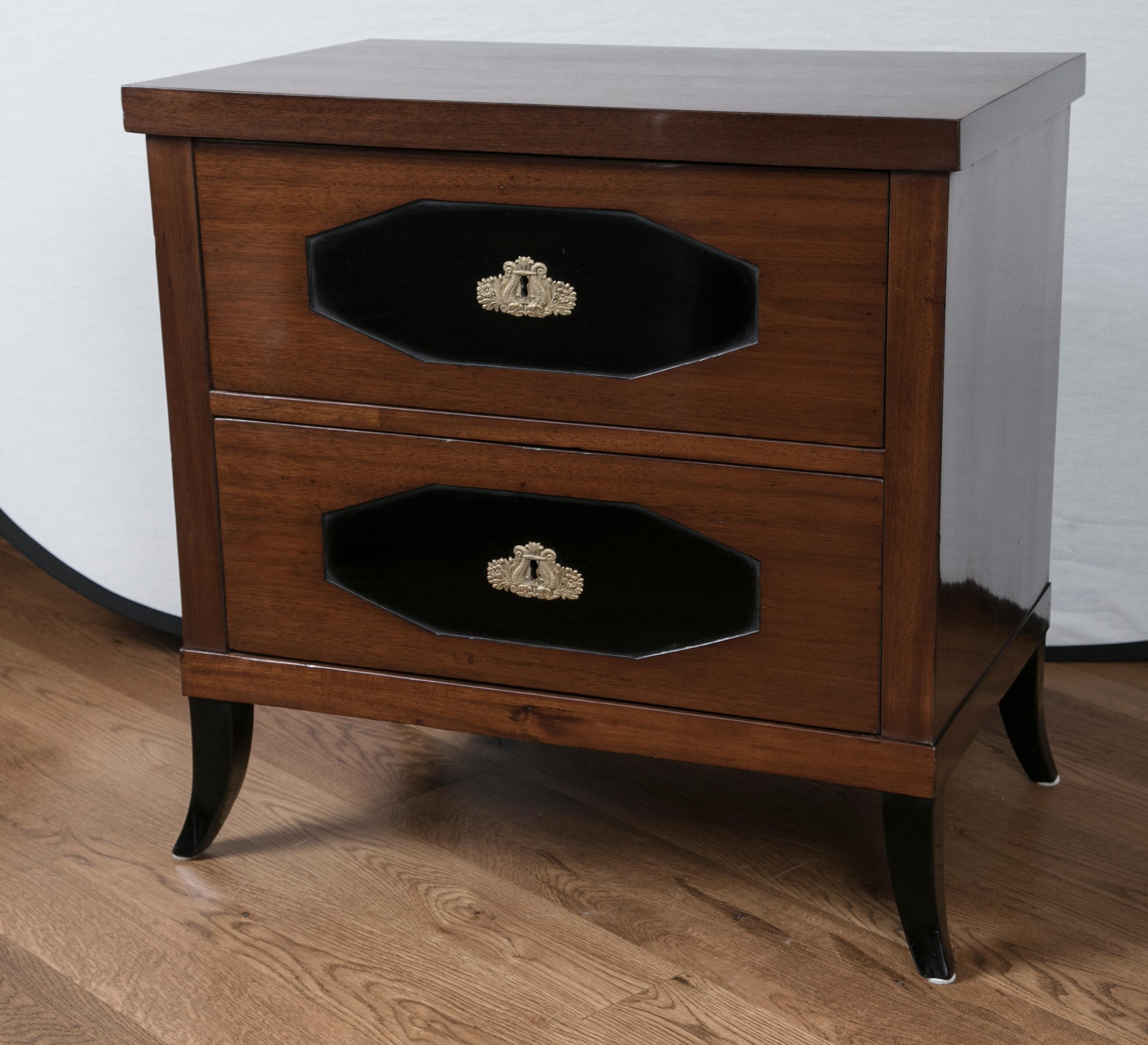 Elegant small neoclassic two drawer chest in walnut veneer on pine with ebonized interior panels and splayed legs, all original
Origin: Vienna
Condition: Excellent, French polished
Dimension: 30 1/2