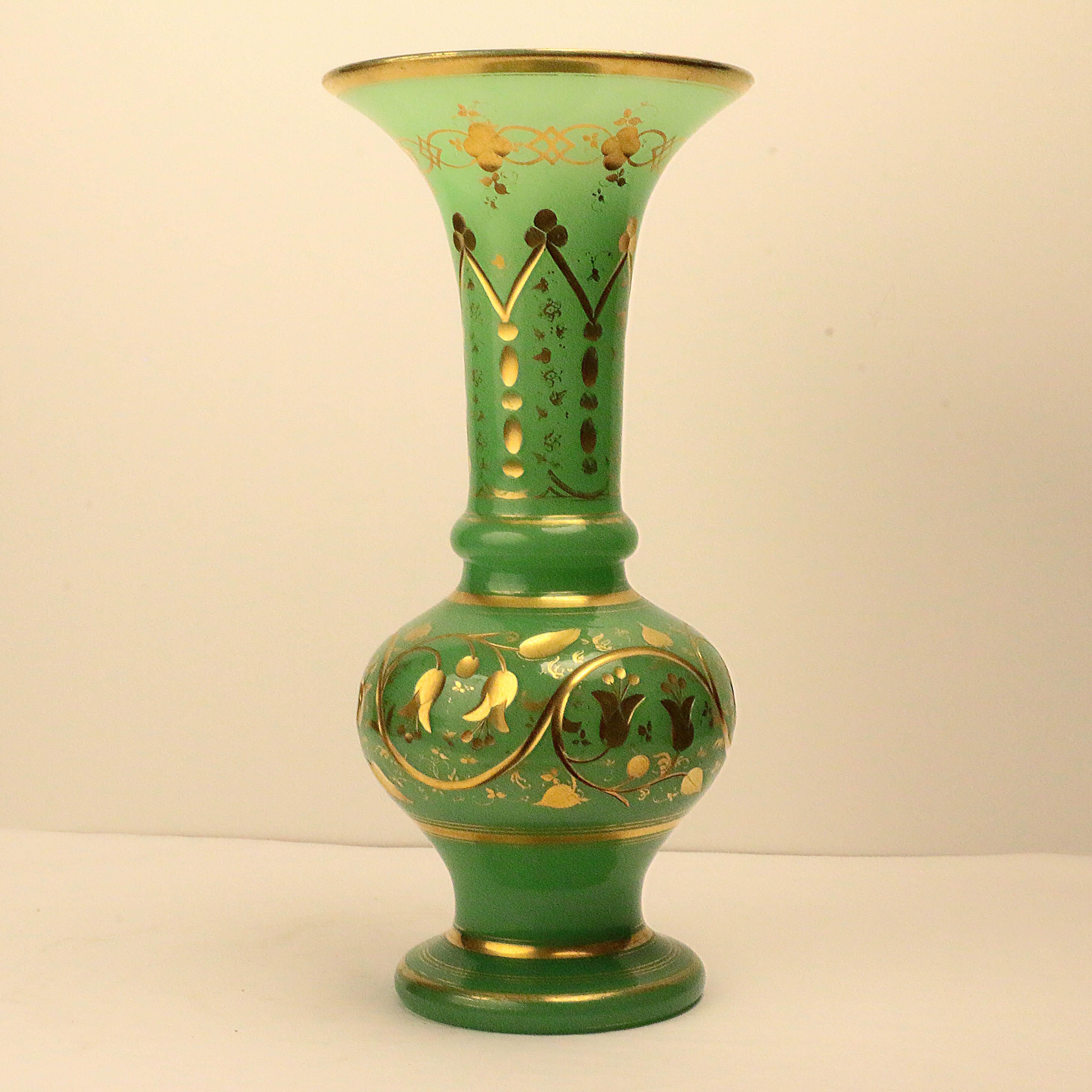 This vase is part of a Swiss collection we have recently acquired. This color enters the palette of French glass makers in the 1840s following experiments in manufacturing. This vase is beautifully blown by a master. raised on a round foot to a