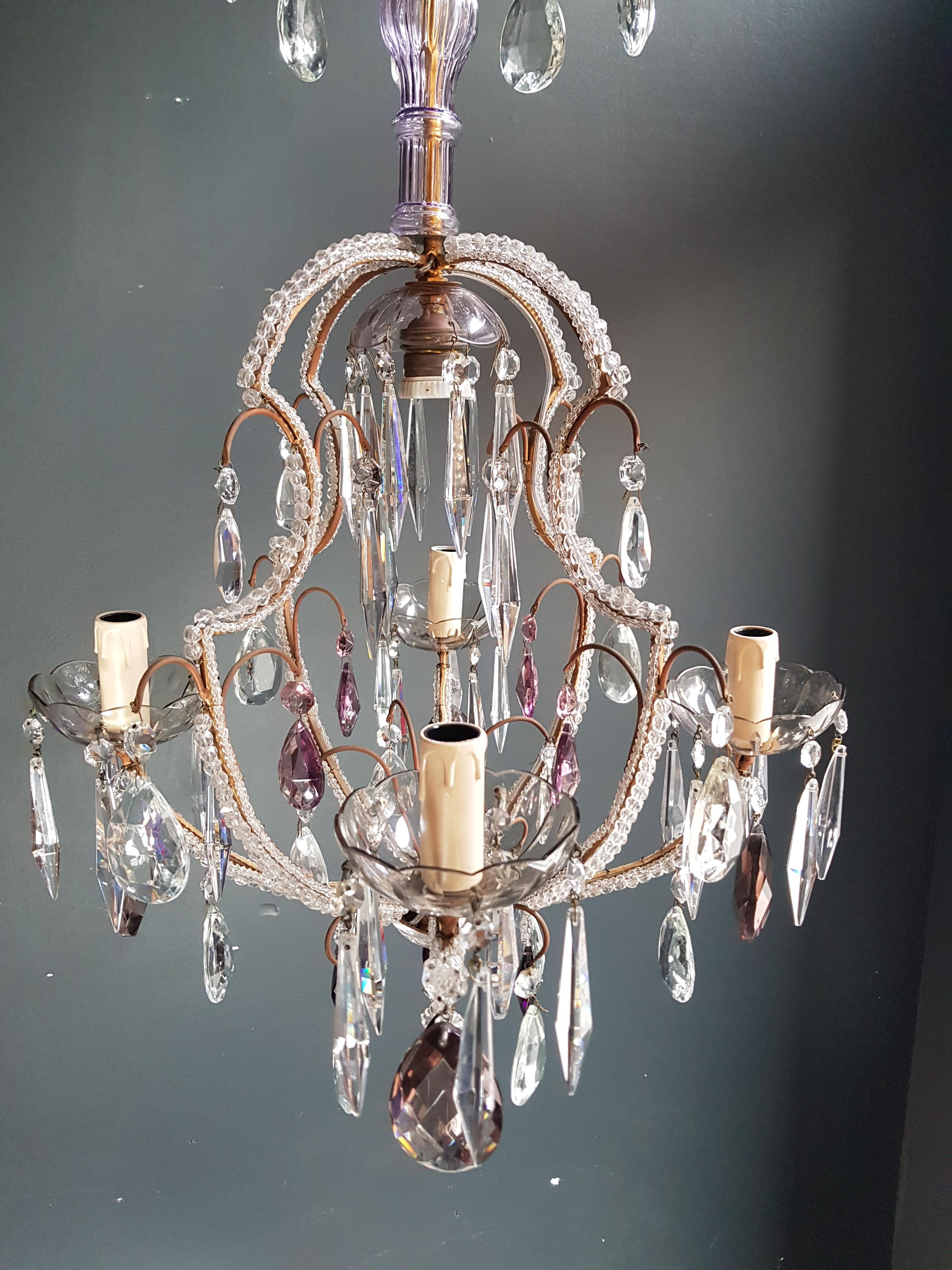 Measures: Total height 99 cm, height without chain 75 cm, diameter 47 cm. Weight (approximately): 7 kg.

Number of lights: 4-light bulb sockets: x E14 and One E27 material: glass, crystal.

Total length variable. Works worldwide

Fine beaded