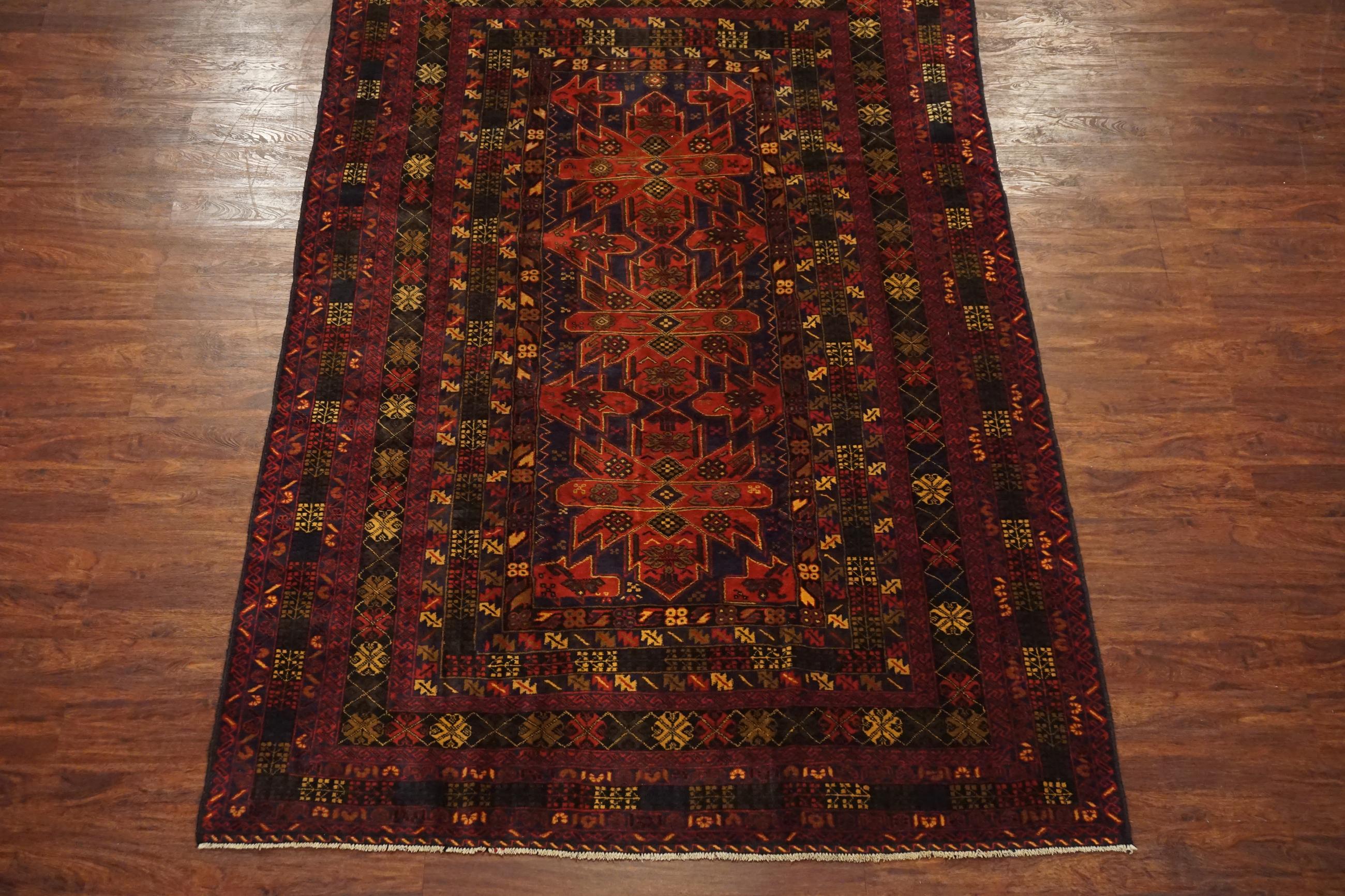 Fine black Afghan tribal area rug

circa 1990

Measures: 6' 3