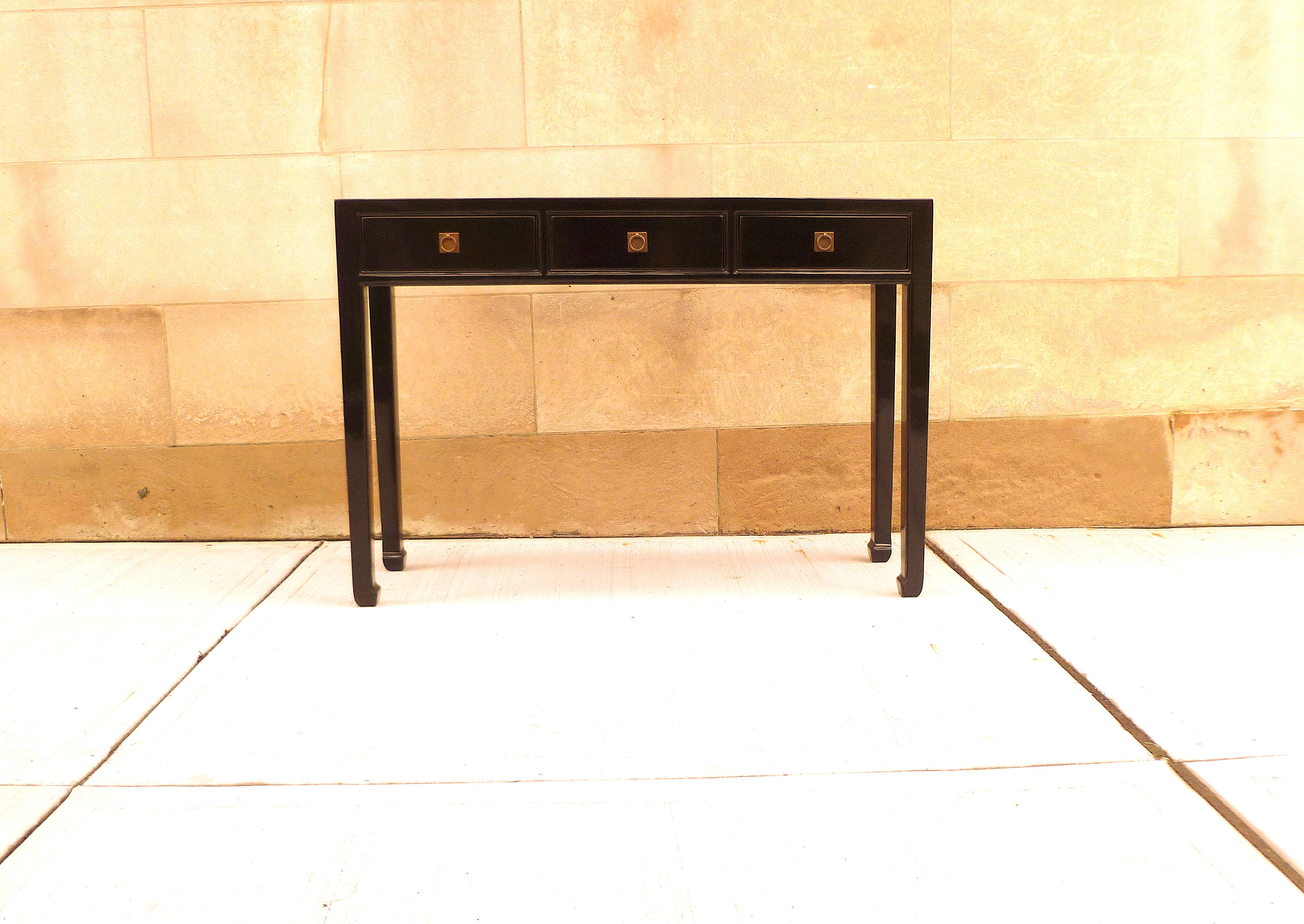 Fine black lacquer console table with drawers, very elegant, simple and beautiful color. We carry fine quality furniture with elegant finished and has been appeared many times in 