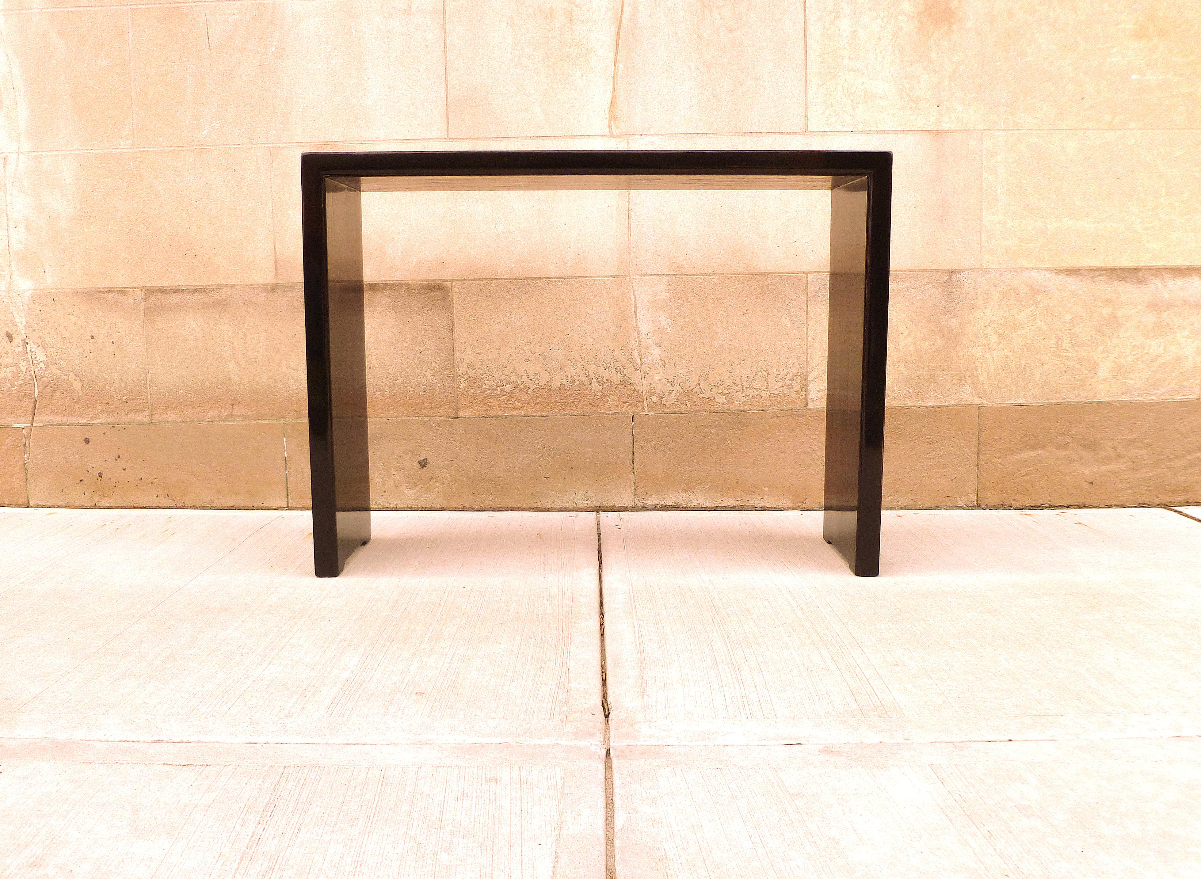 Simple black lacquer console table with waterfall legs, elegant color and lines. We carry fine quality furniture with elegant finished and has been appeared many times in 