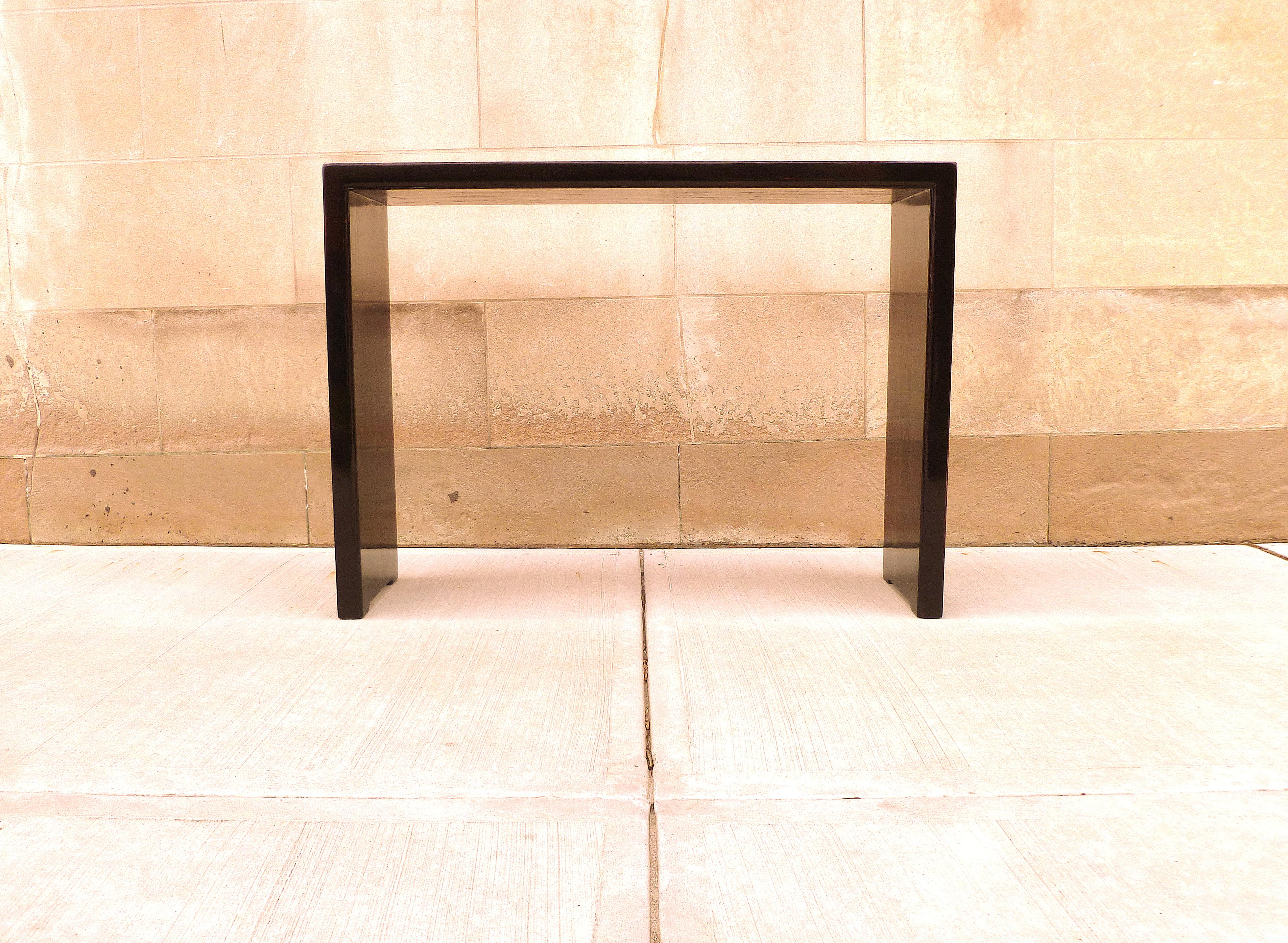 Simple black lacquer console table with waterfall legs, elegant color and lines. We carry Fine quality furniture with elegant finished and has been appeared many times in 