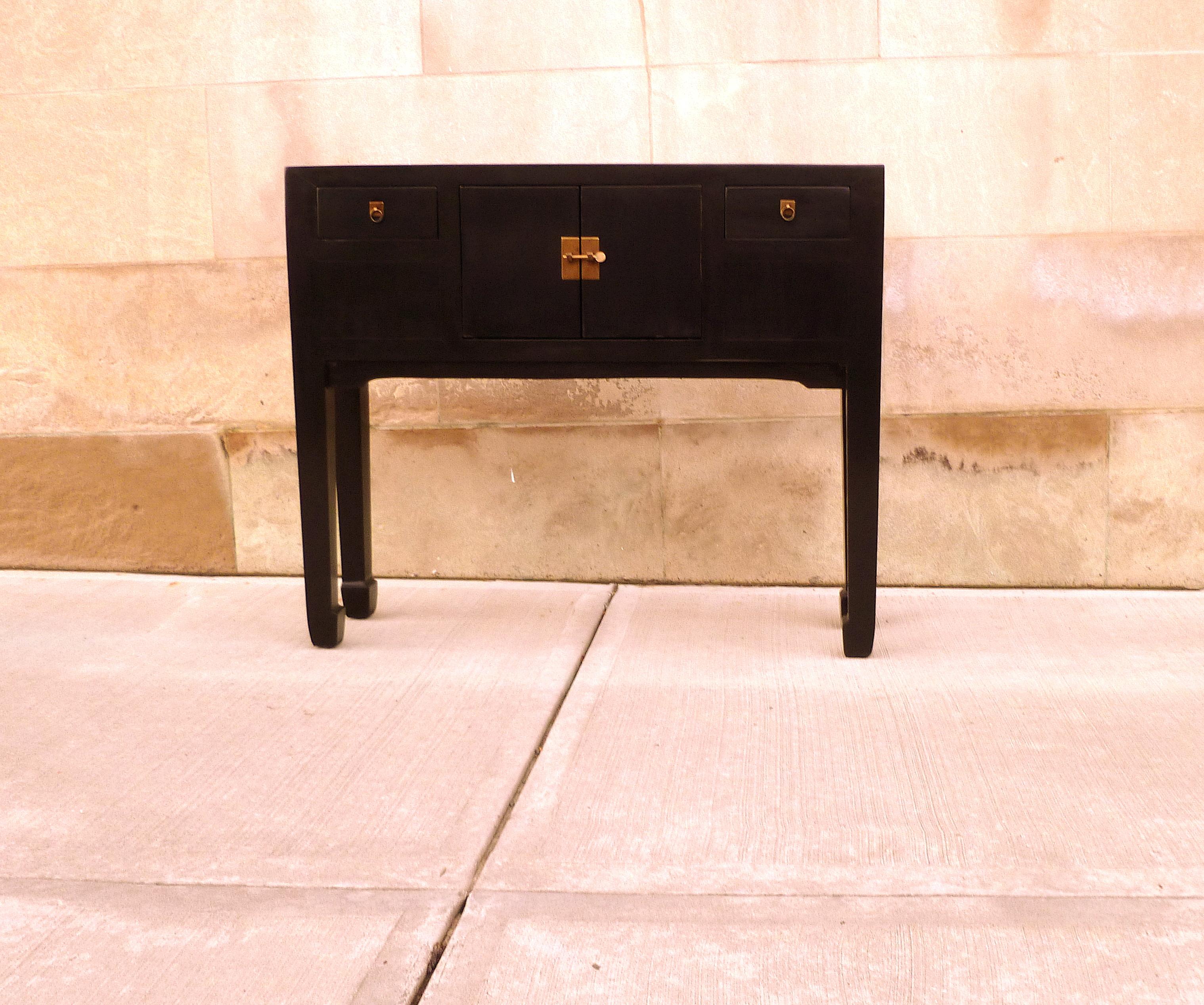 Fine black lacquer console table, very elegant, simple form and beautiful color. We carry fine quality furniture with elegant finished and has been appeared many times in 