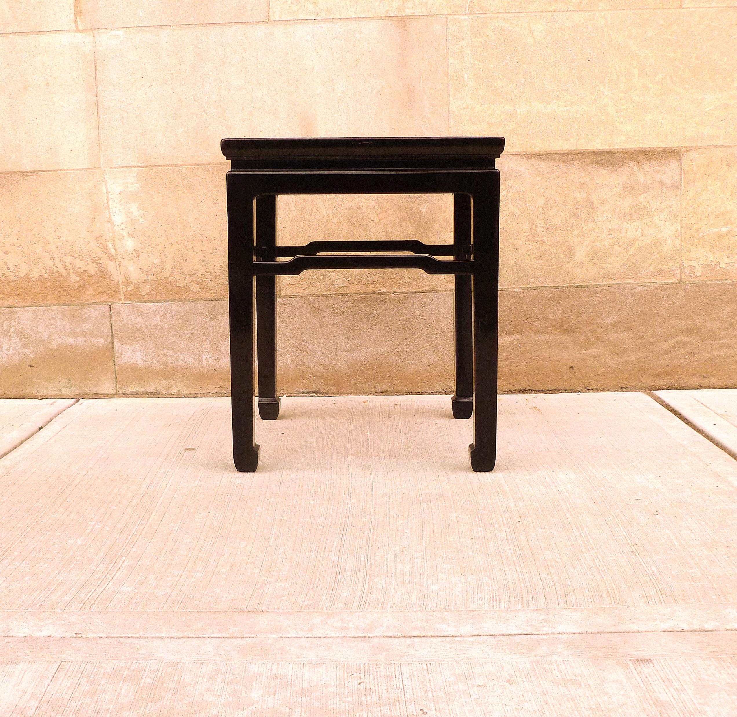 An elegant black lacquer square end table, beautiful color, form and lines. We carry fine quality furniture with elegant finished and has been appeared many times in 