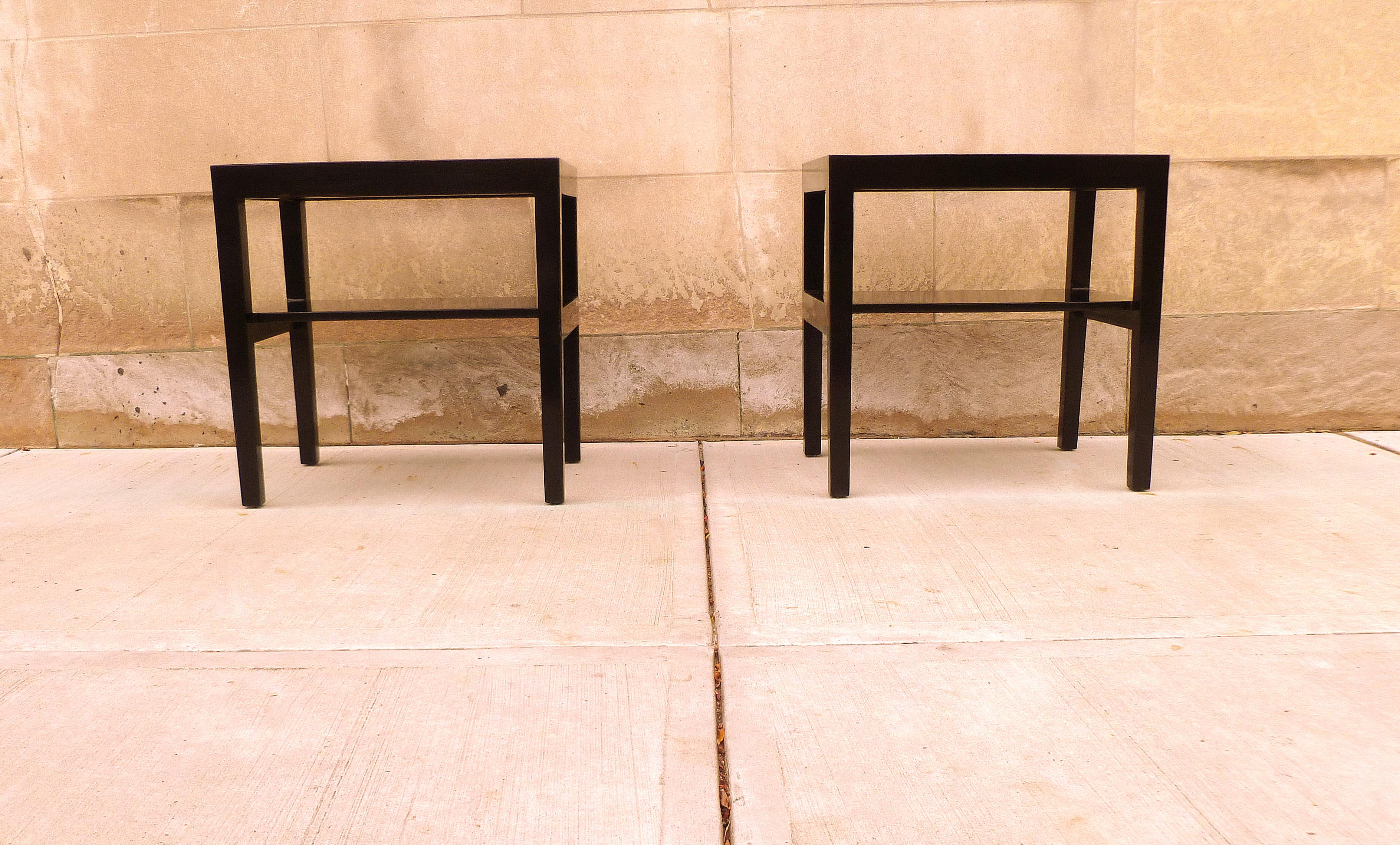 Fine black lacquer end tables / side tables with one shelf. Elegant and fine black lacquer end tables, beautiful form and color. We carry Fine quality furniture with elegant finished and has been appeared many times in 
