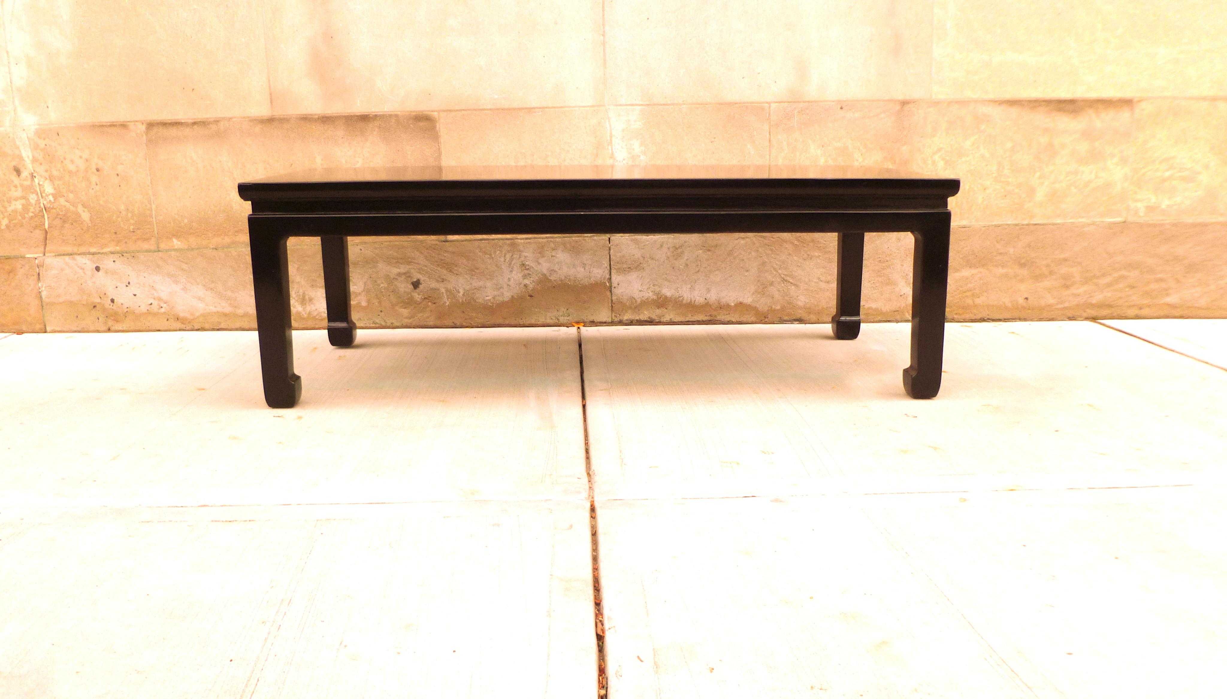An elegant black lacquer rectangular low table with gilt motif landscape top. simple and beautiful form. We carry Fine quality furniture with elegant finished and has been appeared many times in 