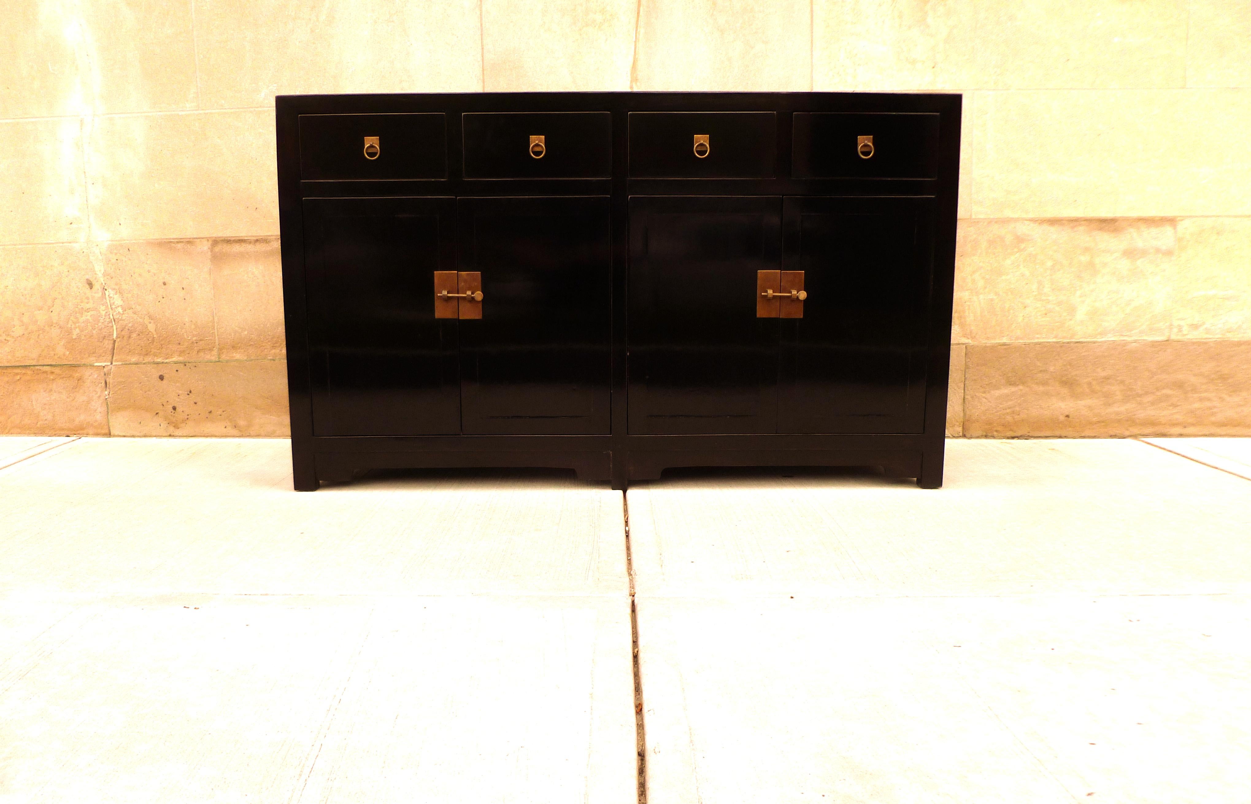Fine black lacquer sideboard with drawers and open doors. Very elegant, simple form and beautiful color. We carry fine quality furniture with elegant finished and has been appeared many times in 