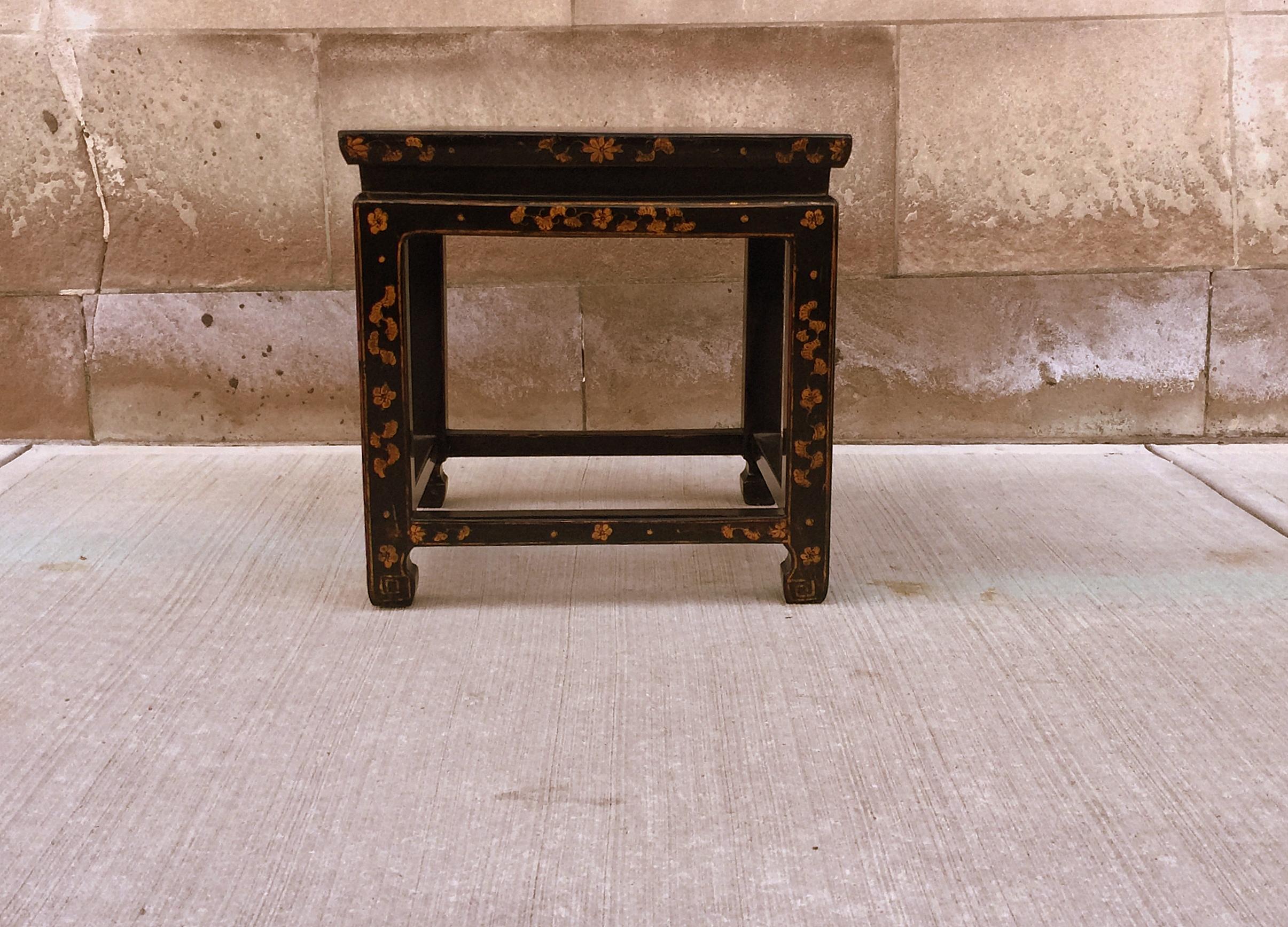 An elegant black lacquer square stool / end table with hand painted gold gilt motif on the sides,
We carry fine quality furniture with elegant finished and has been appeared many times in 