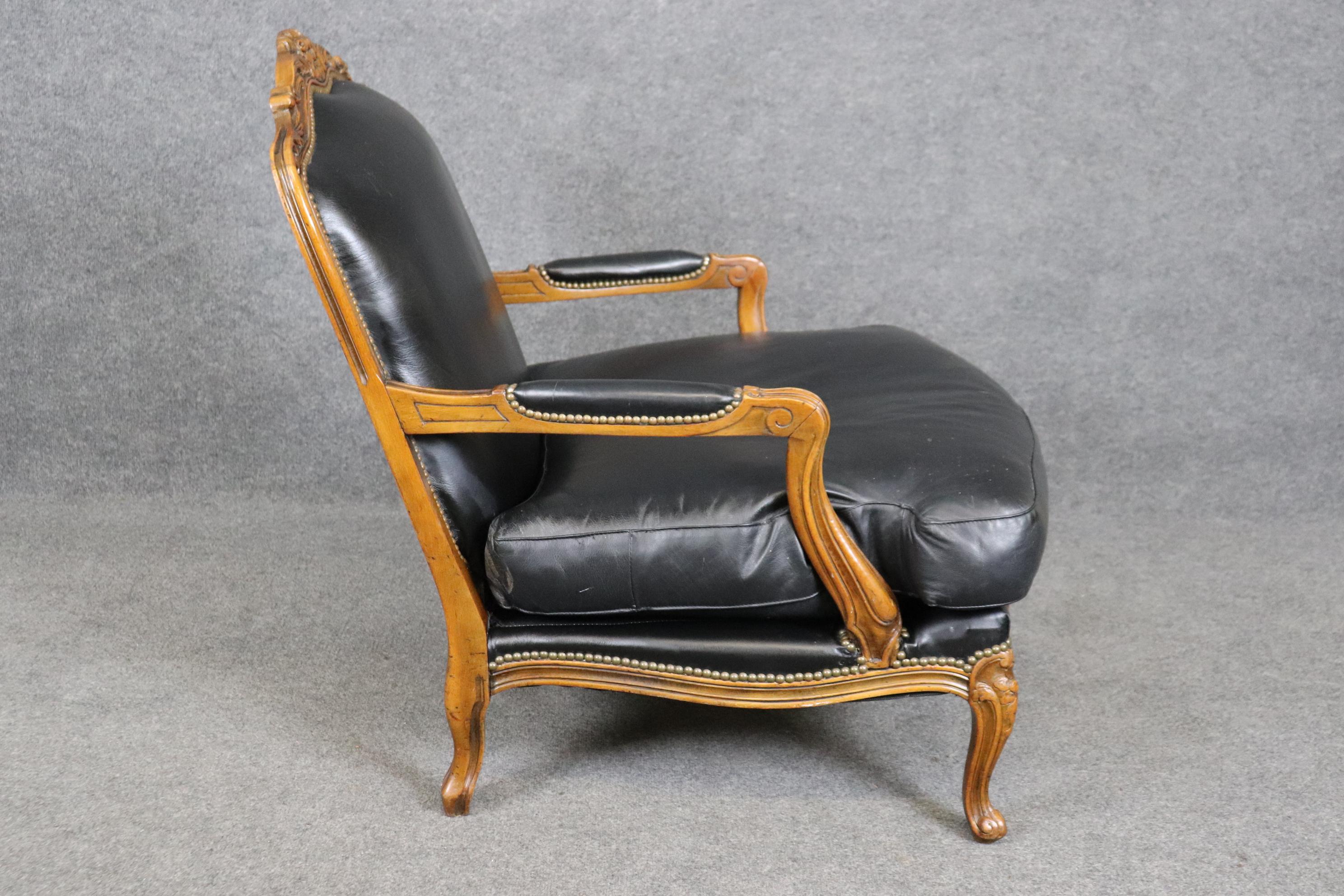 Fine Black Leather Carved French Louis XV Style Bergere Chair and Ottoman In Good Condition In Swedesboro, NJ