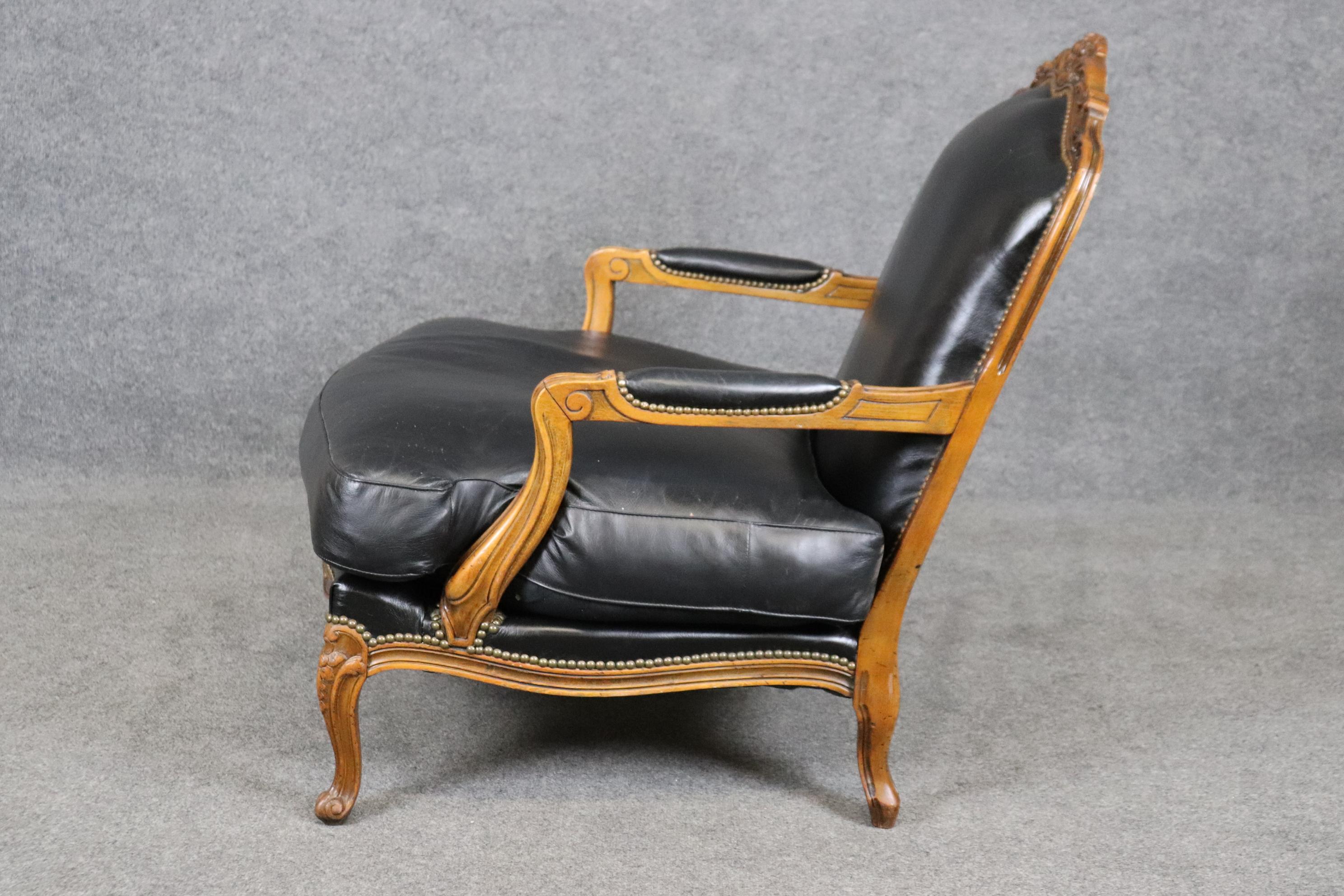 Late 20th Century Fine Black Leather Carved French Louis XV Style Bergere Chair and Ottoman