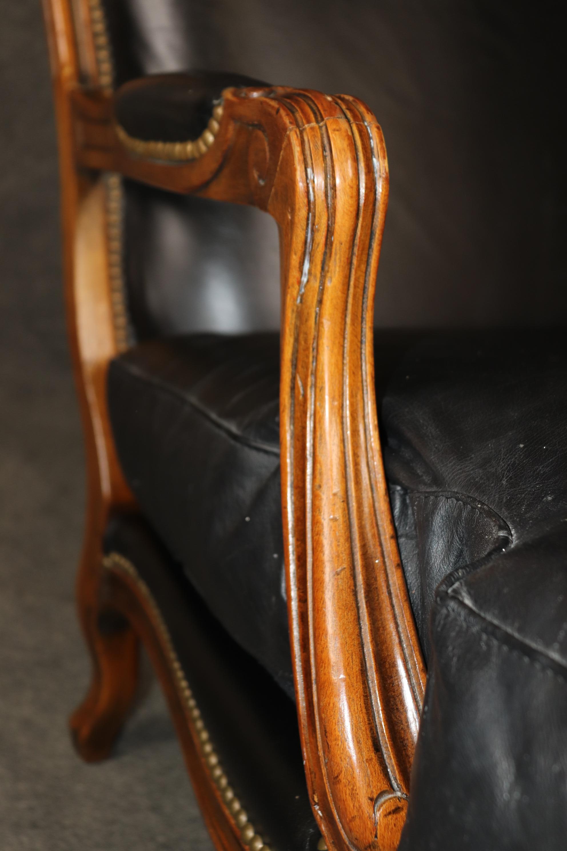 Fine Black Leather Carved French Louis XV Style Bergere Chair and Ottoman 4