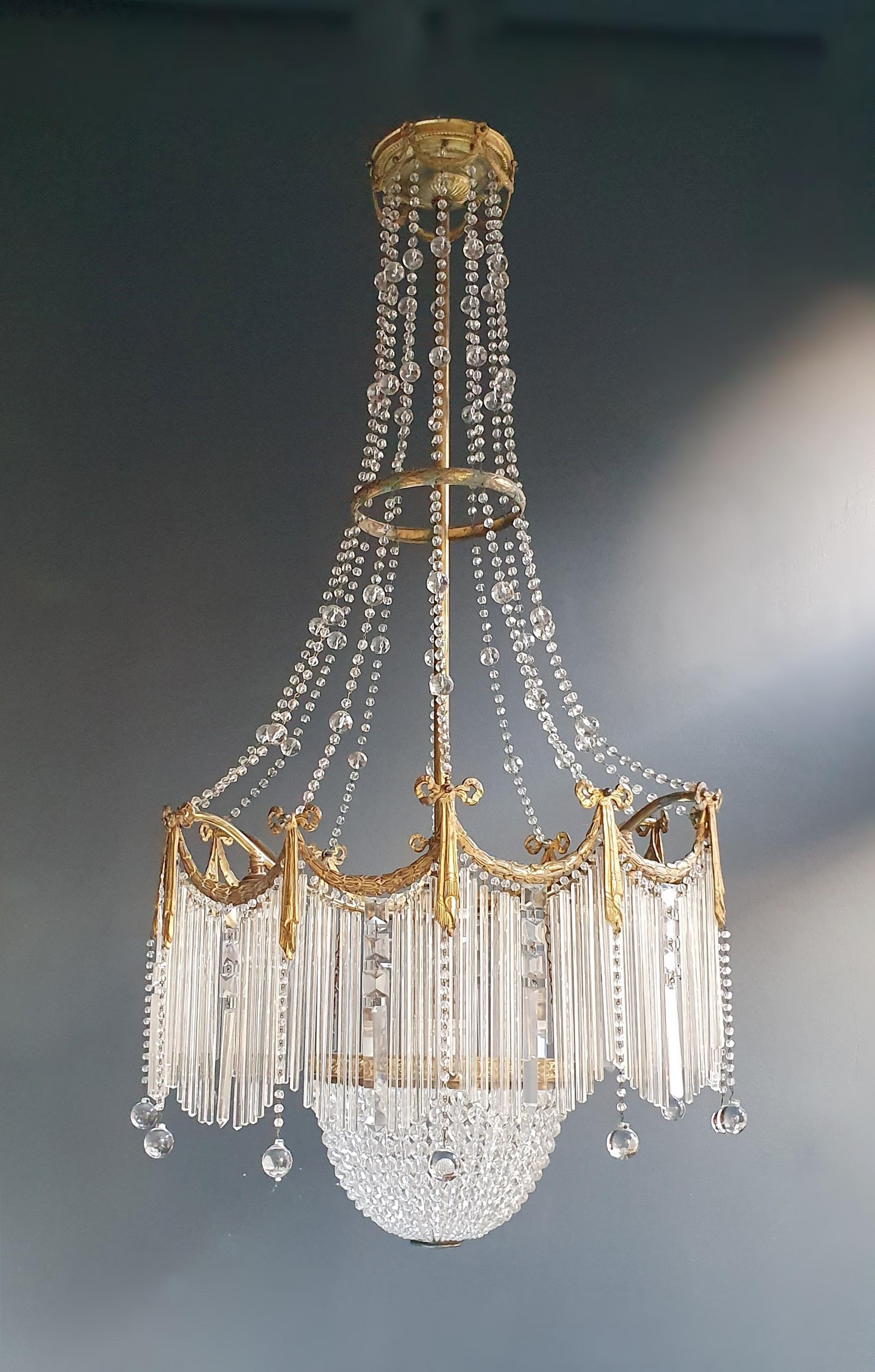 Fine brass crystal chandelier antique ceiling lamp lustre Art Nouveau lamp, 1900.

Measures: Total height 120 cm, diameter 60 cm. Weight (approximately): 10kg.

Number of lights: 7-light bulb sockets: E28
material: Brass, glass, crystal

New