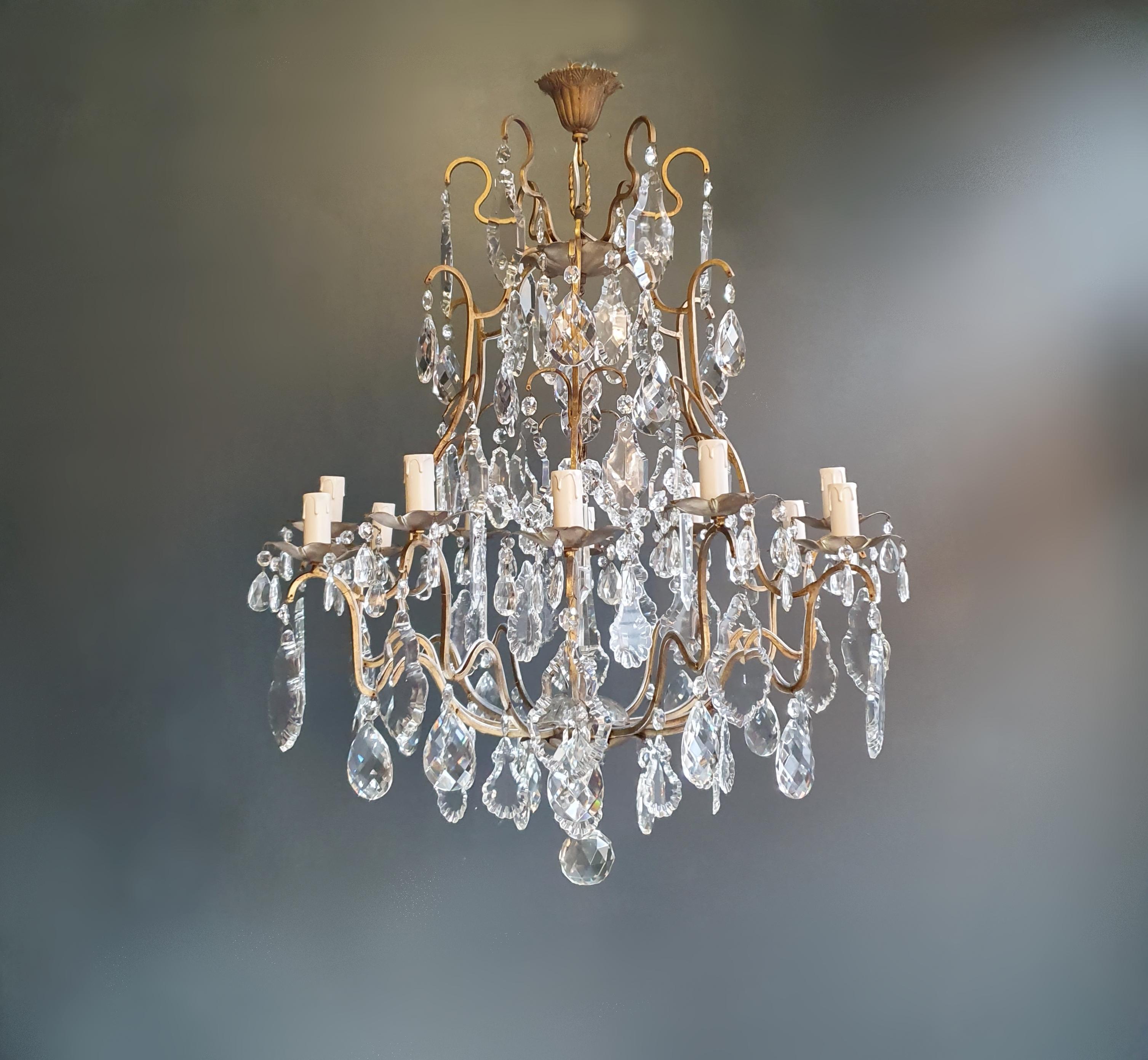 Fine brass crystal chandelier antique ceiling lamp lustre Art Nouveau lamp

Measures: Total height 90 cm, height without chain 85 cm diameter 73 cm. Weight (approximately) 15kg.

Number of lights: 12-light bulb sockets: E14
Material: Brass,