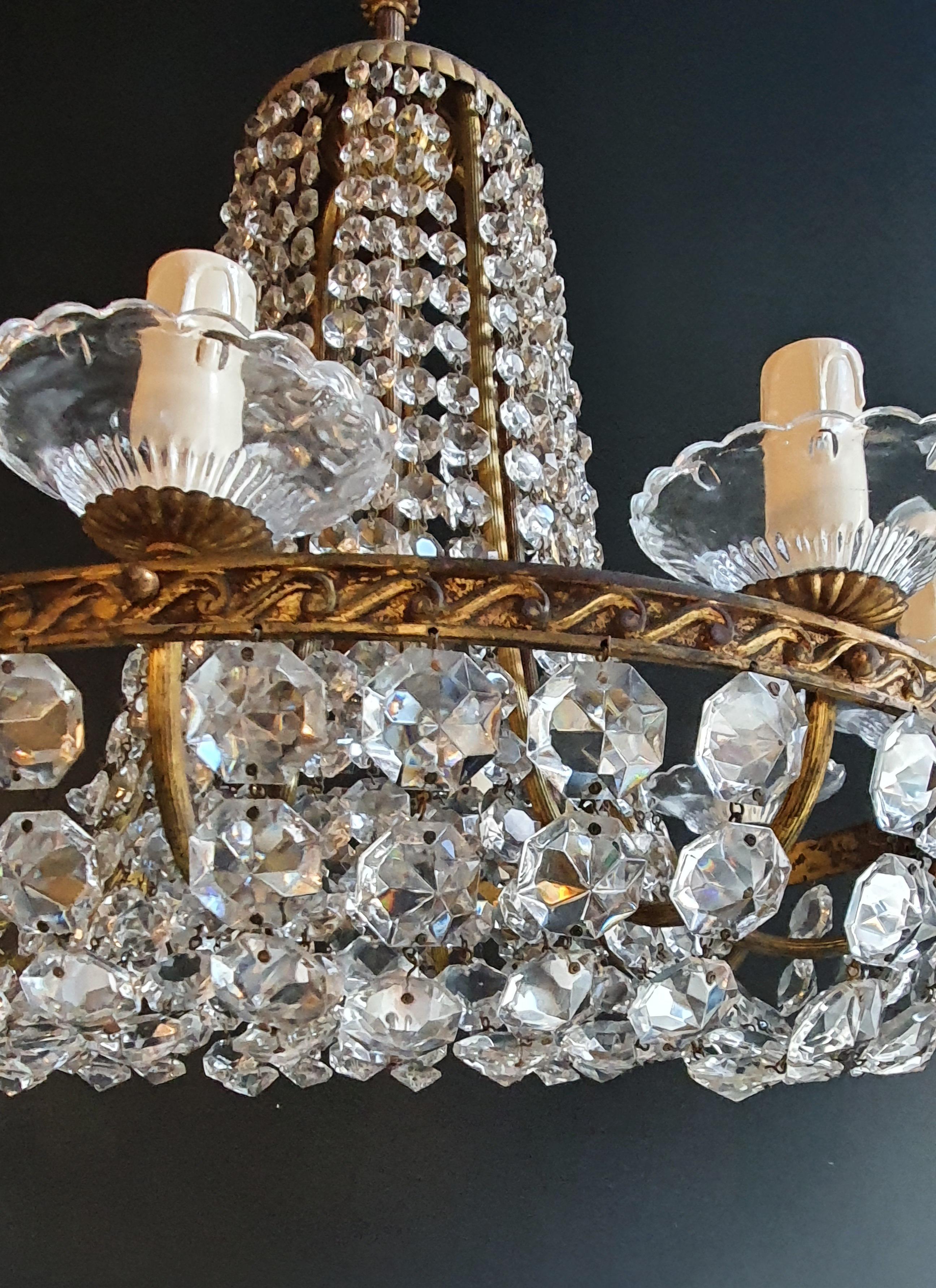 Old chandelier with love and professionally restored in Berlin. electrical wiring works in the US. Re-wired and ready to hang. not one missing. Cabling completely renewed. Crystal, hand-knotted.

Cabling and sockets completely renewed. Crystal hand