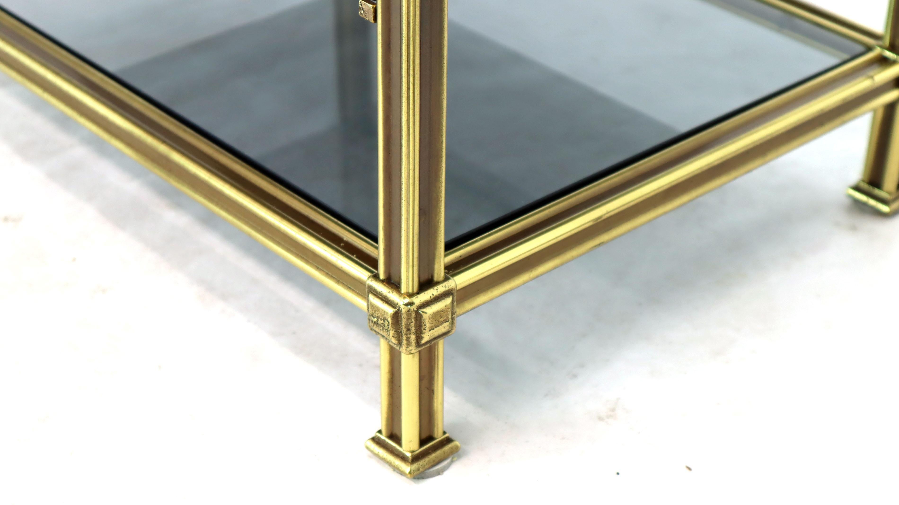 Very fine brass and smoked glass magazine rack paper stand tray.