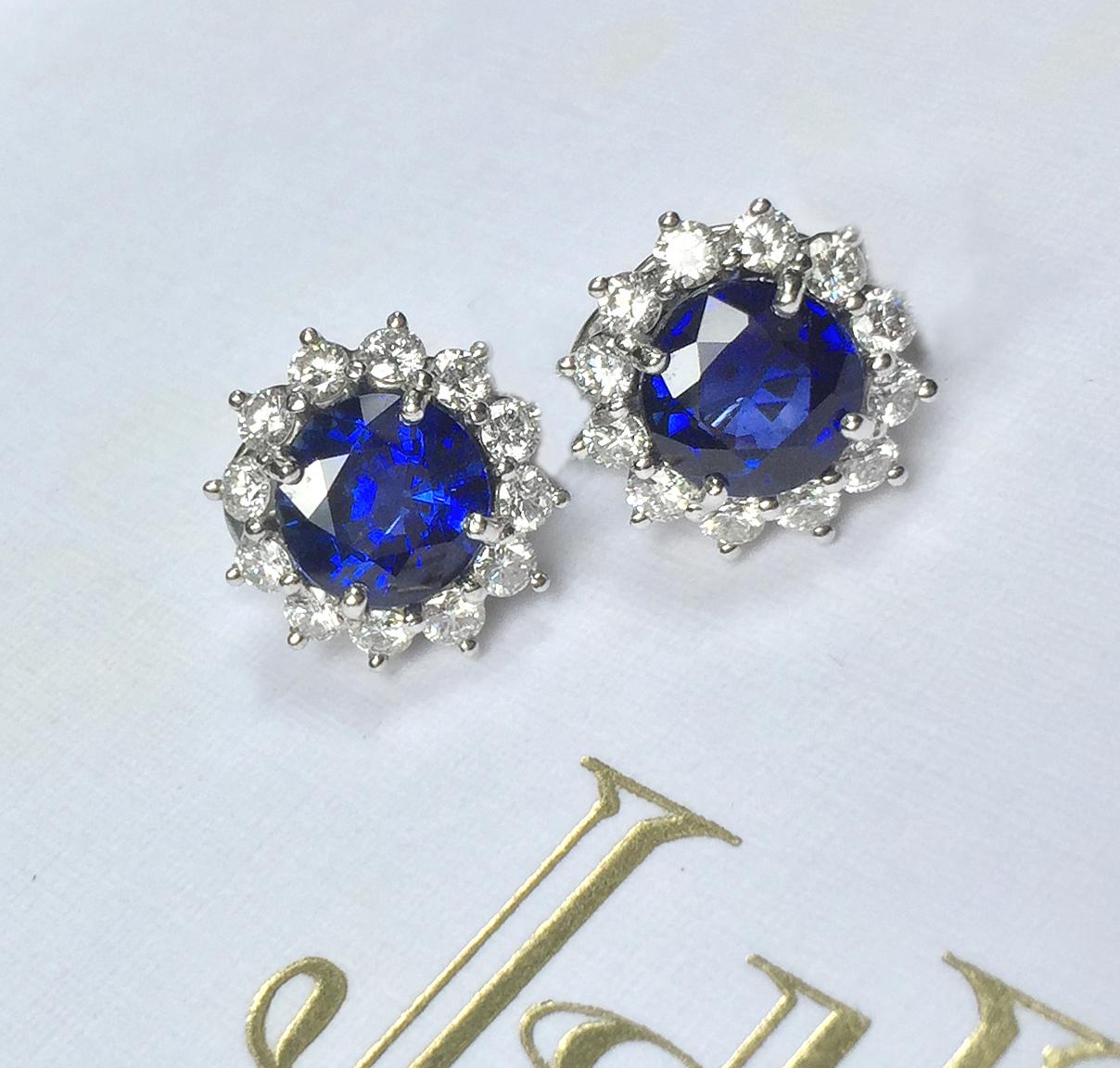 Fine, Brilliant Cut Blue Sapphire & Diamond earrings in Platinum - Round Brilliant cut Sapphires 
weighing 6.25 cts ( 8.5 mm ) claw set with row of Brilliant cut Diamonds- Earrings are made with post and clip backings that can easily be modified for
