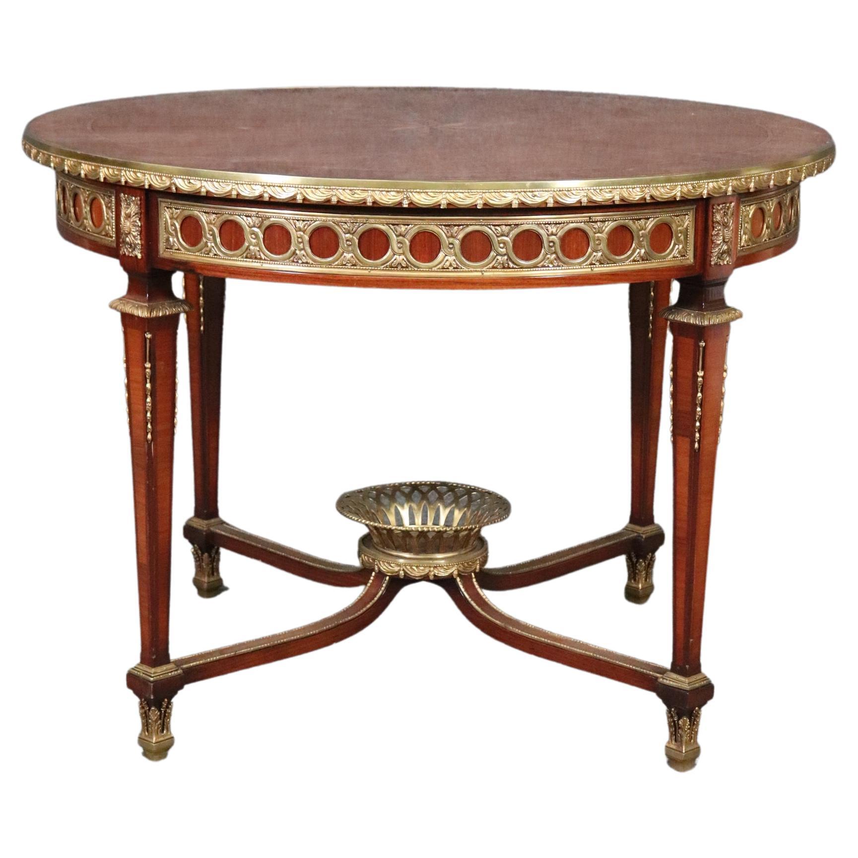 Table centrale en satin et bois de roi, montée sur bronze, à la manière de The Weisweiler
